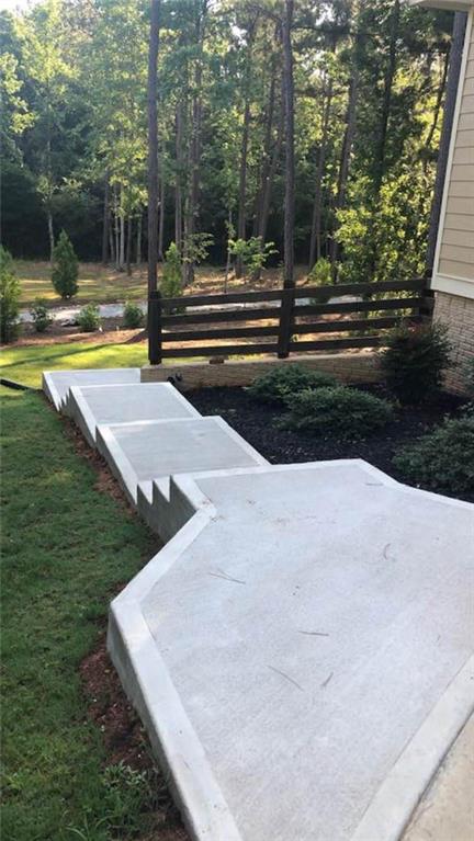 37 Farmstead Way Senoia, GA 30276 - Photo 31 of 96 a view of a yard with swimming pool
