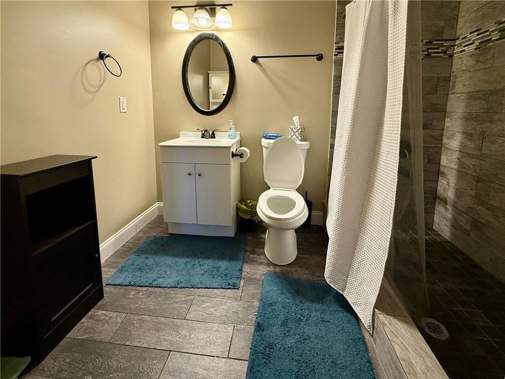 37 Farmstead Way Senoia, GA 30276 - Photo 56 of 96 a bathroom with a toilet and a mirror