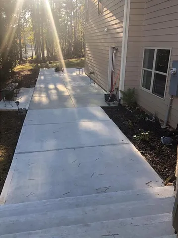 a kitchen with stainless steel appliances a stove a sink and a refrigerator