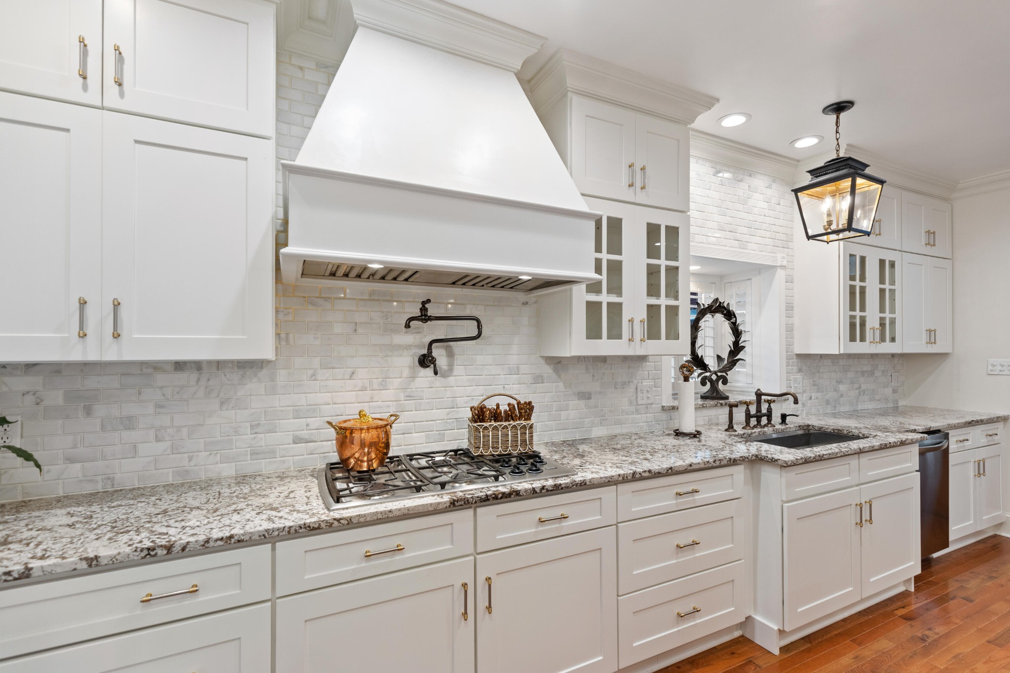 8421 Pedigo Road Powell, TN 37849 - Photo 12 of 57 a kitchen with granite countertop white cabinets and white stainless steel appliances