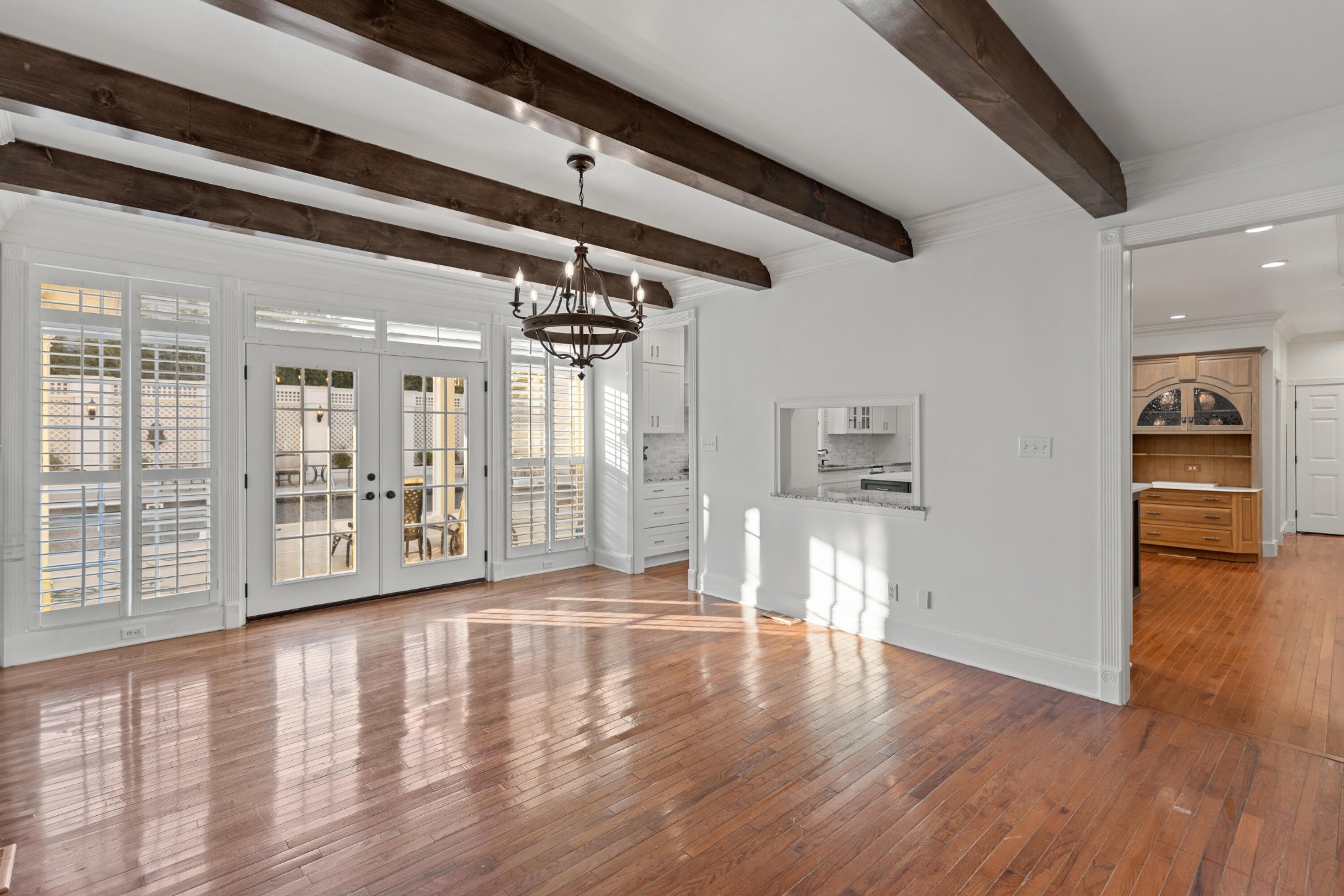 8421 Pedigo Road Powell, TN 37849 - Photo 13 of 57 a view of an empty room with wooden floor and a window