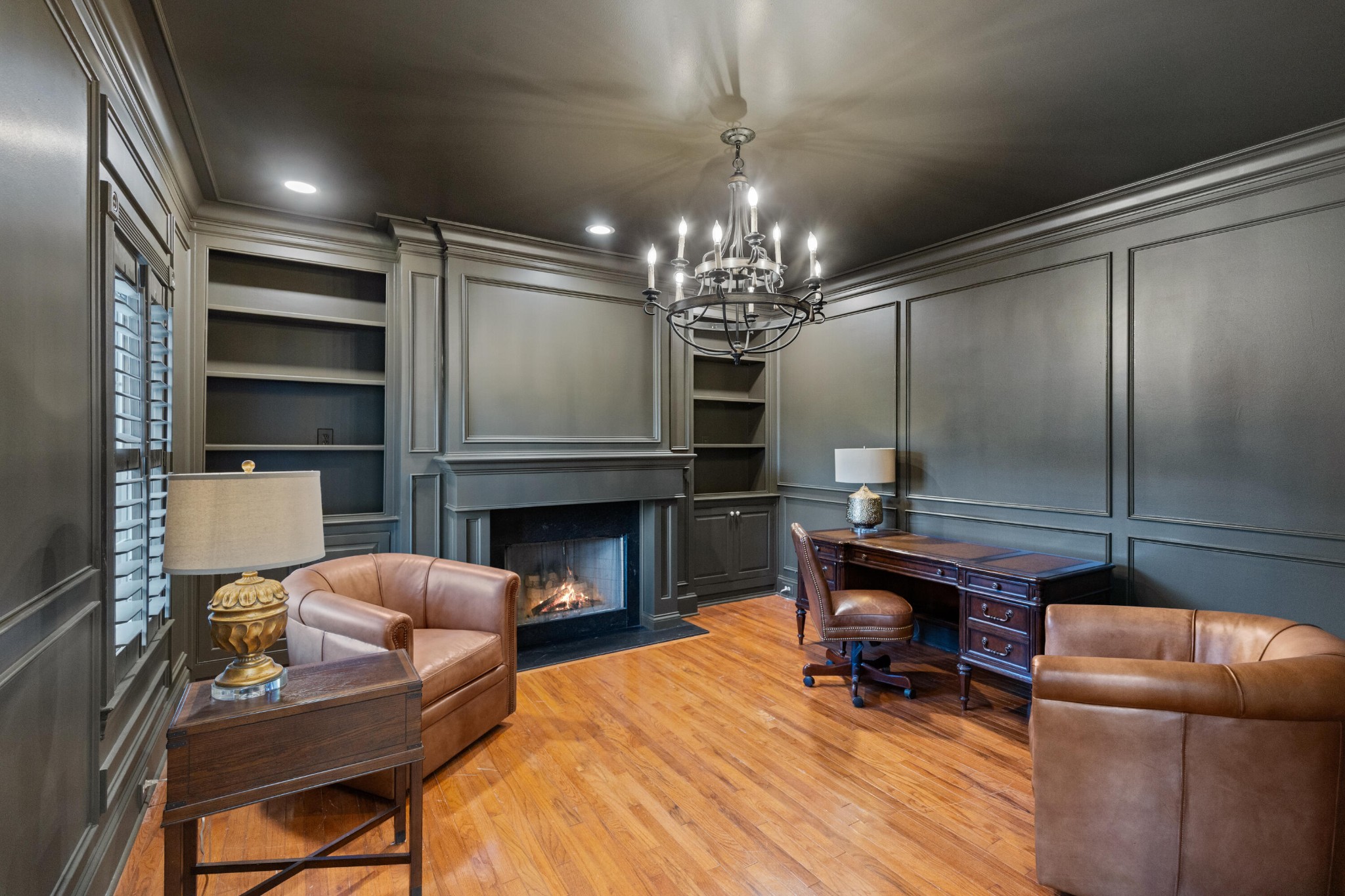 8421 Pedigo Road Powell, TN 37849 - Photo 15 of 57 a living room with furniture a fireplace and a chandelier