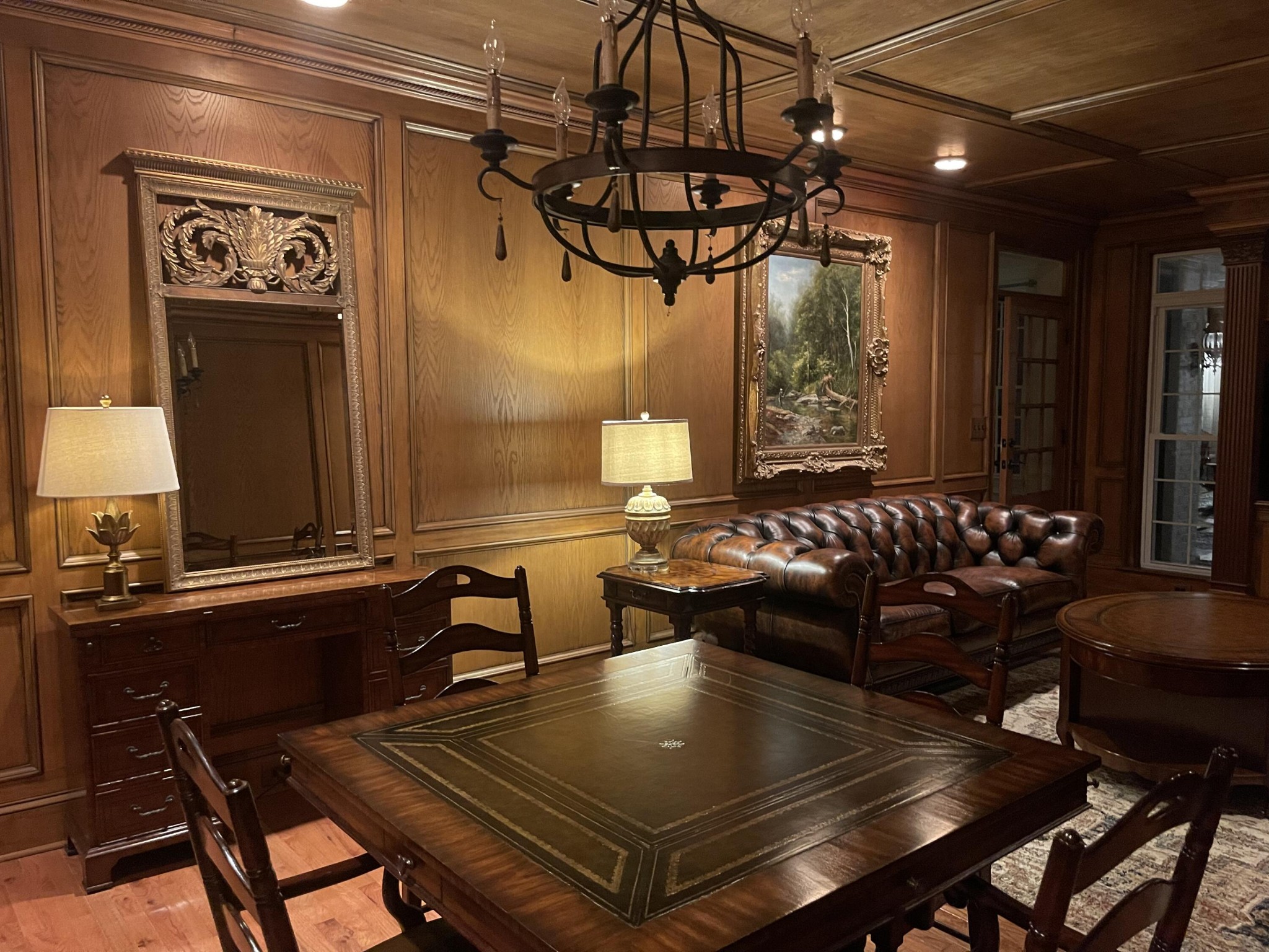 8421 Pedigo Road Powell, TN 37849 - Photo 21 of 57 a living room with a table chairs and a chandelier