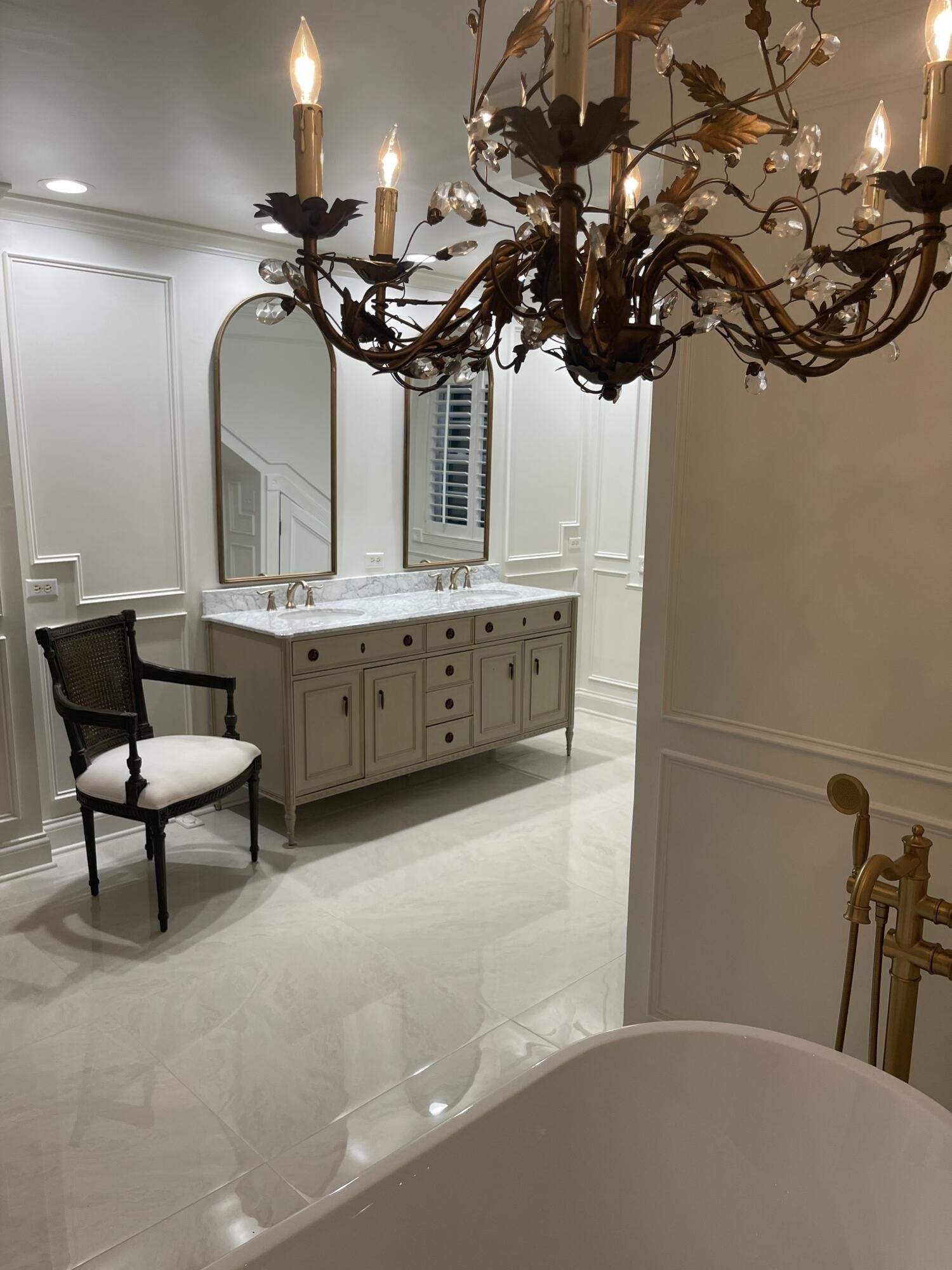 8421 Pedigo Road Powell, TN 37849 - Photo 27 of 57 a bathroom with a double vanity sink and a mirror