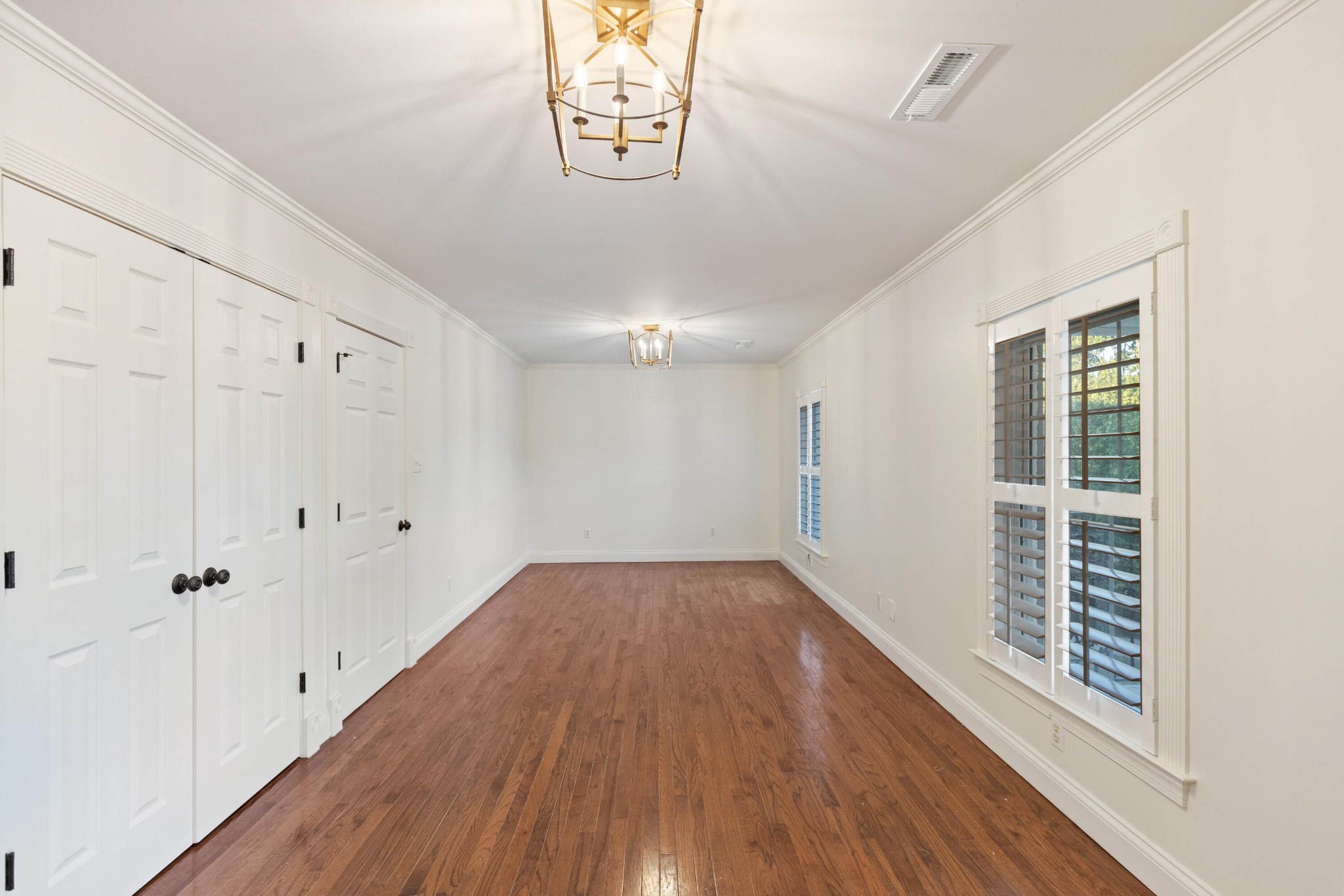 8421 Pedigo Road Powell, TN 37849 - Photo 34 of 57 a view of a hallway with wooden floor