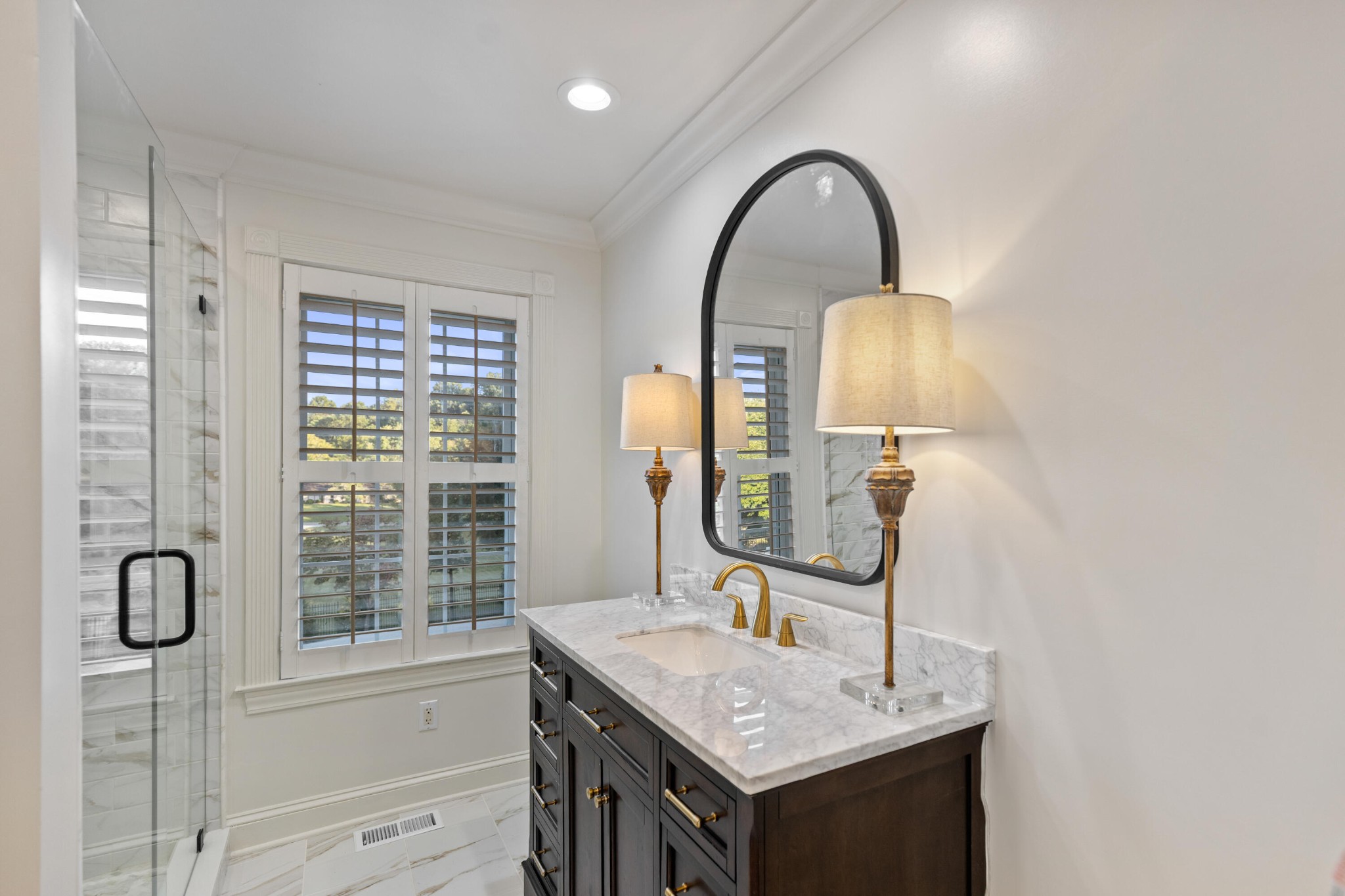 8421 Pedigo Road Powell, TN 37849 - Photo 36 of 57 a bathroom with a sink and a mirror