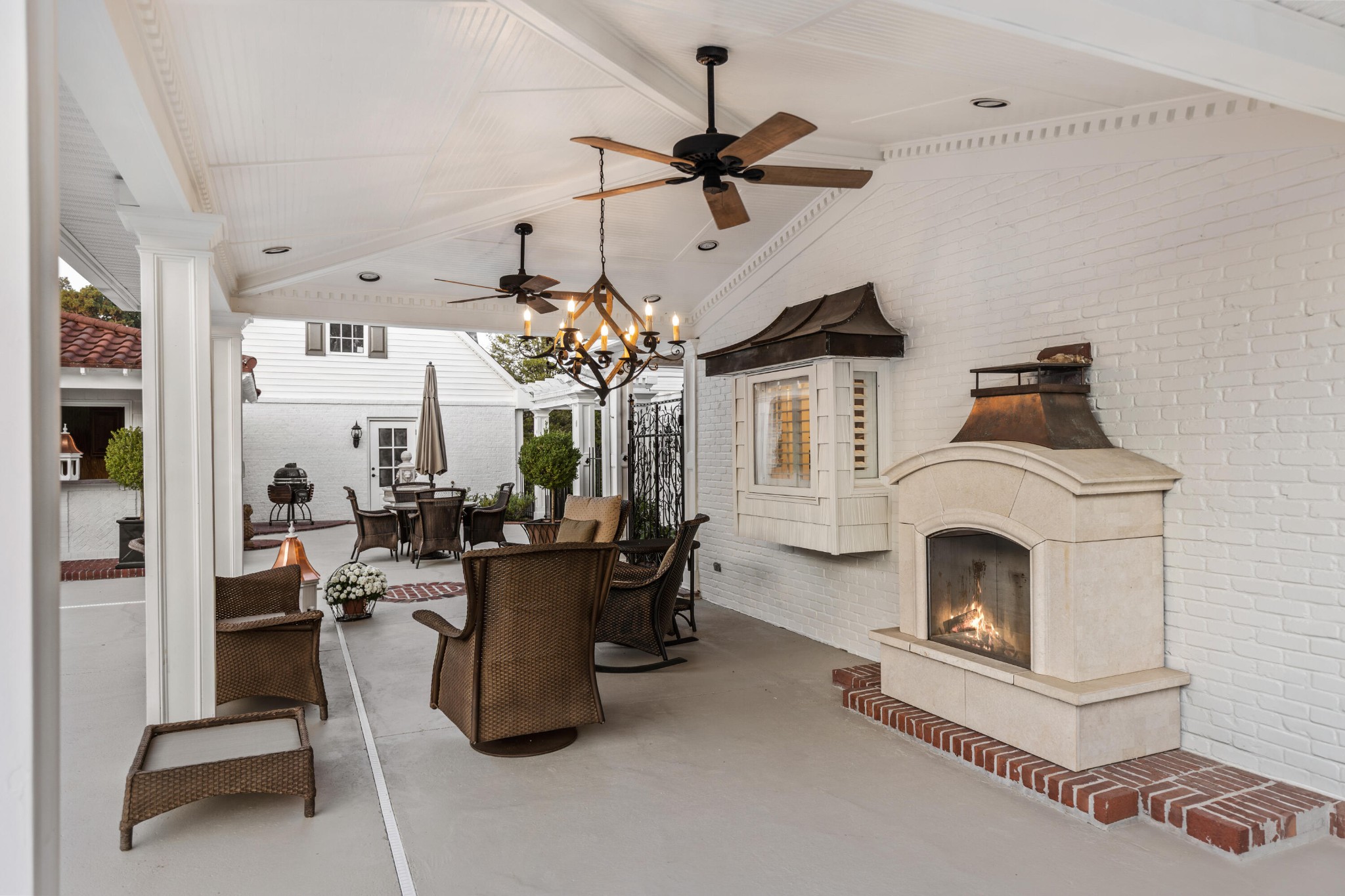 8421 Pedigo Road Powell, TN 37849 - Photo 52 of 57 a living room with furniture a fireplace and chandelier