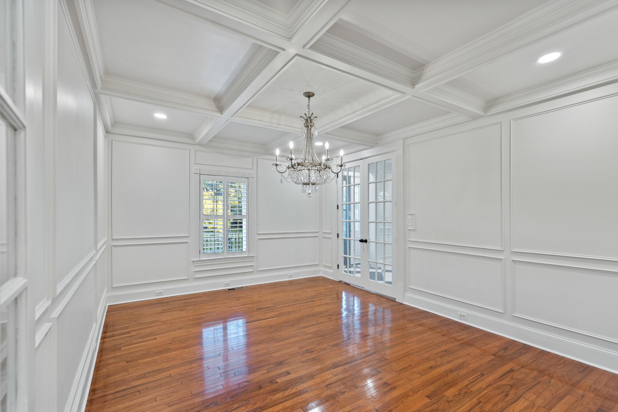 8421 Pedigo Road Powell, TN 37849 - Photo 6 of 57 a view of an empty room with wooden floor and a window