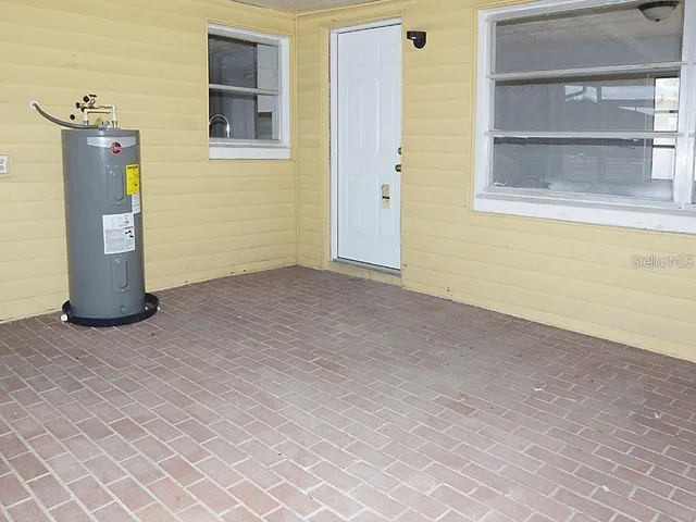 an empty room with a door