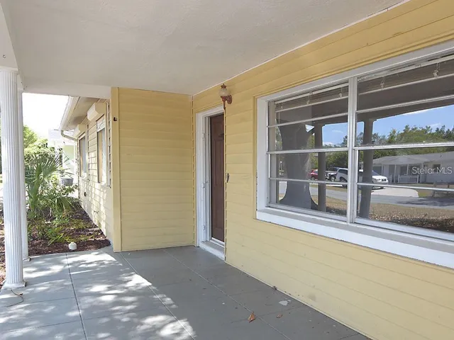 a view of a house with a porch