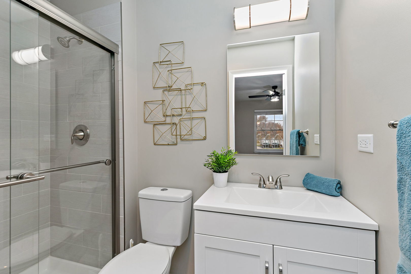 218 Deerpath Court, Unit B2 Schaumburg, IL 60193 - Photo 17 of 21 a bathroom with a sink toilet and shower