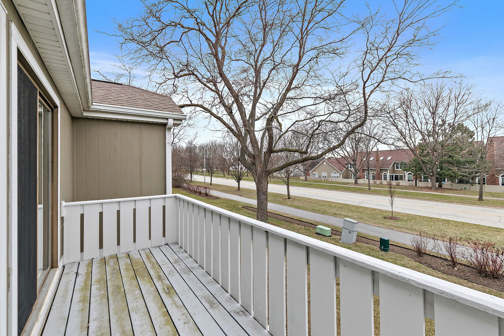 218 Deerpath Court, Unit B2 Schaumburg, IL 60193 - Photo 20 of 21 a view of a house with a large window