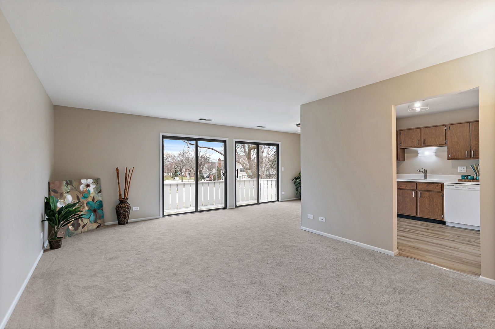218 Deerpath Court, Unit B2 Schaumburg, IL 60193 - Photo 2 of 21 a view of an empty room with a window