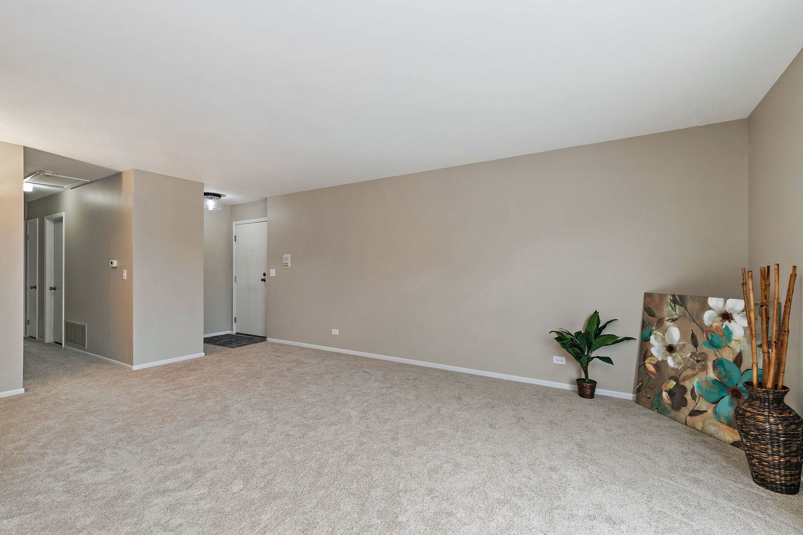 218 Deerpath Court, Unit B2 Schaumburg, IL 60193 - Photo 3 of 21 a view of an empty room and a window