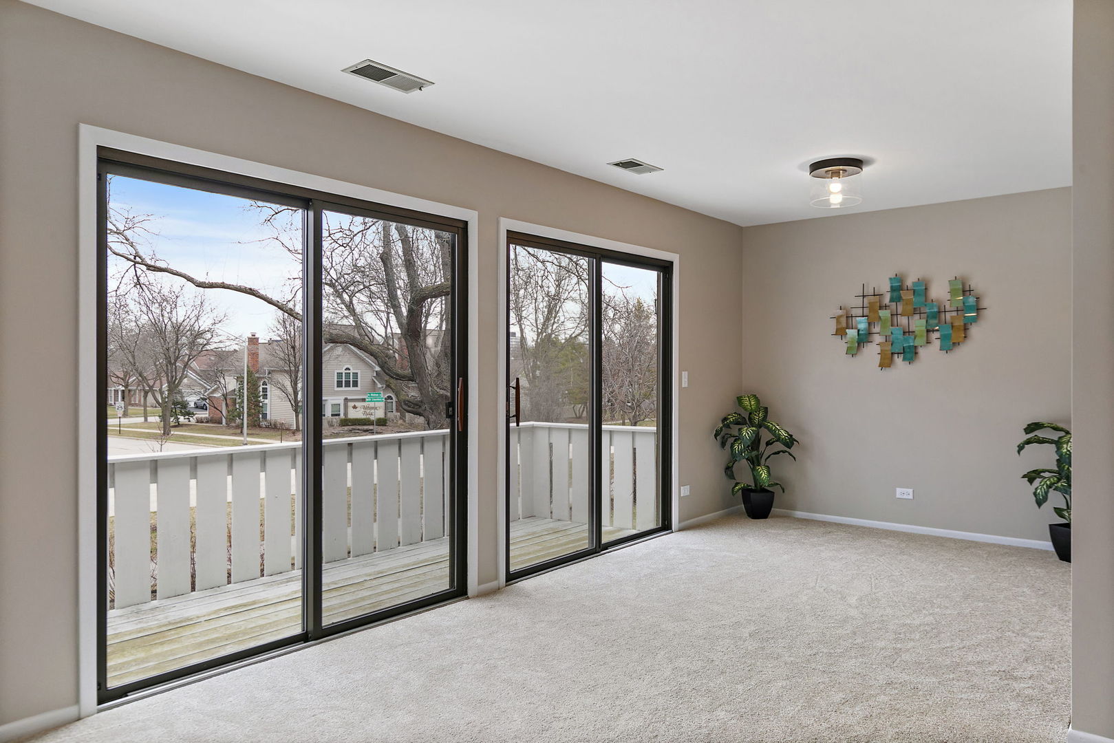 218 Deerpath Court, Unit B2 Schaumburg, IL 60193 - Photo 5 of 21 a view of an empty room with a window