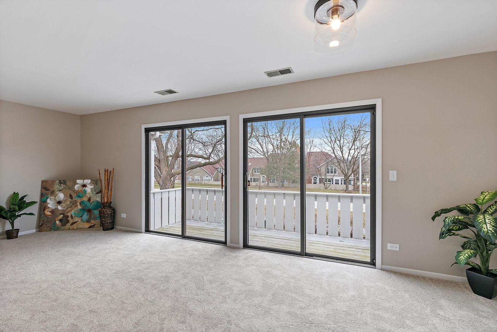218 Deerpath Court, Unit B2 Schaumburg, IL 60193 - Photo 8 of 21 an empty room with window