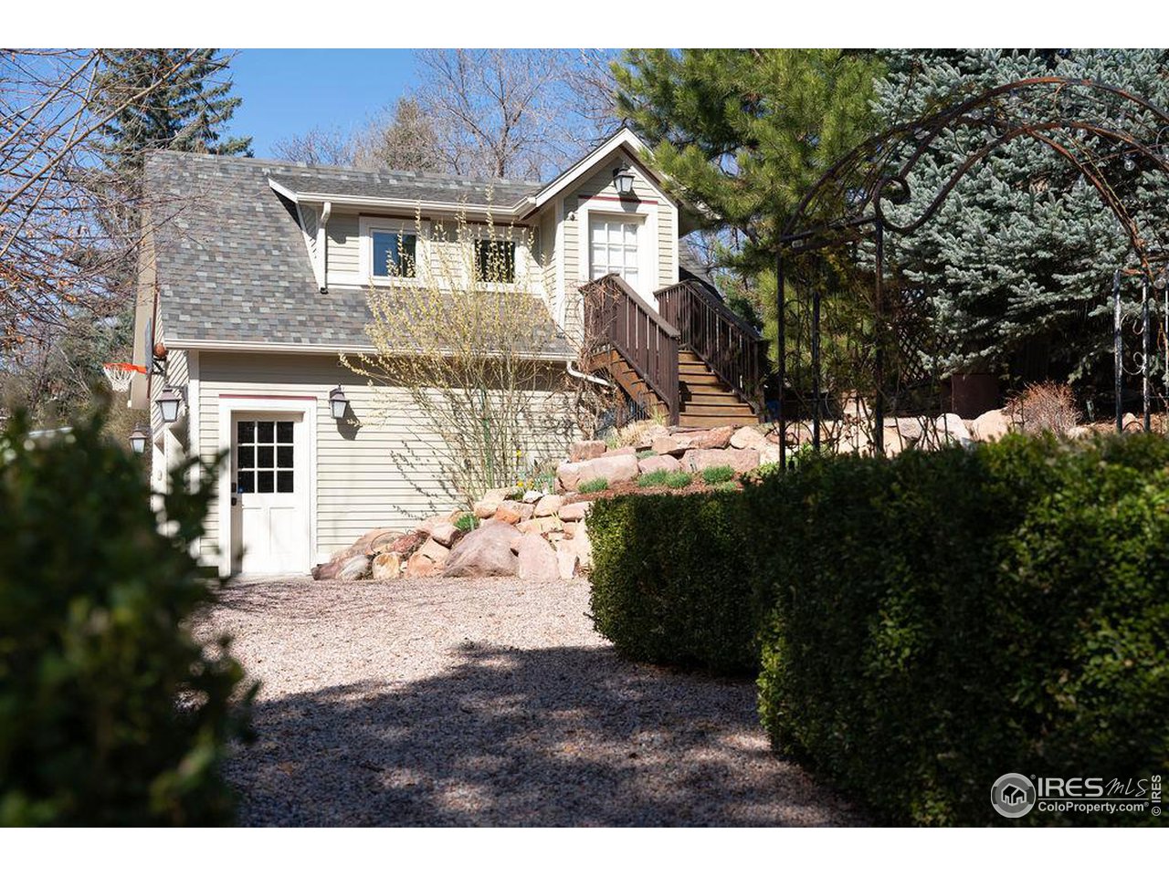 809 Pine Street Boulder, CO 80302 - Photo 9 of 13 a view of house with yard