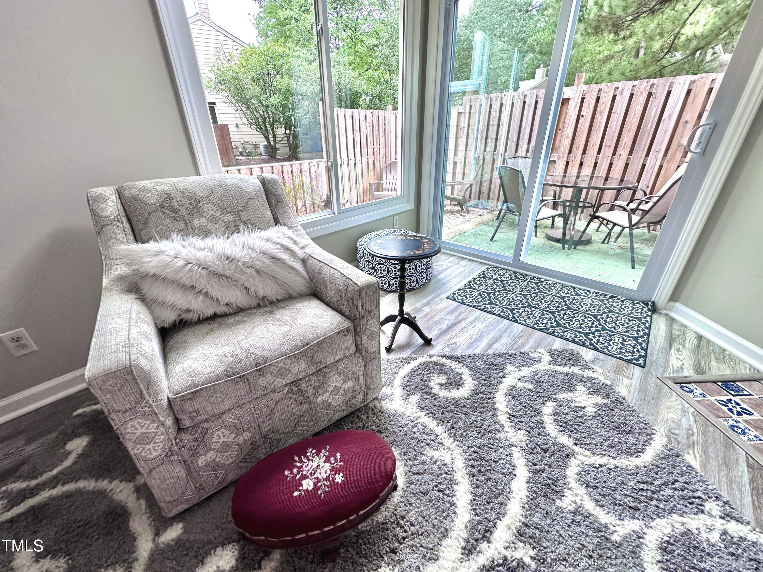 4311 Beechnut Lane Durham, NC 27707 - Photo 13 of 56 a living room with furniture and a large window