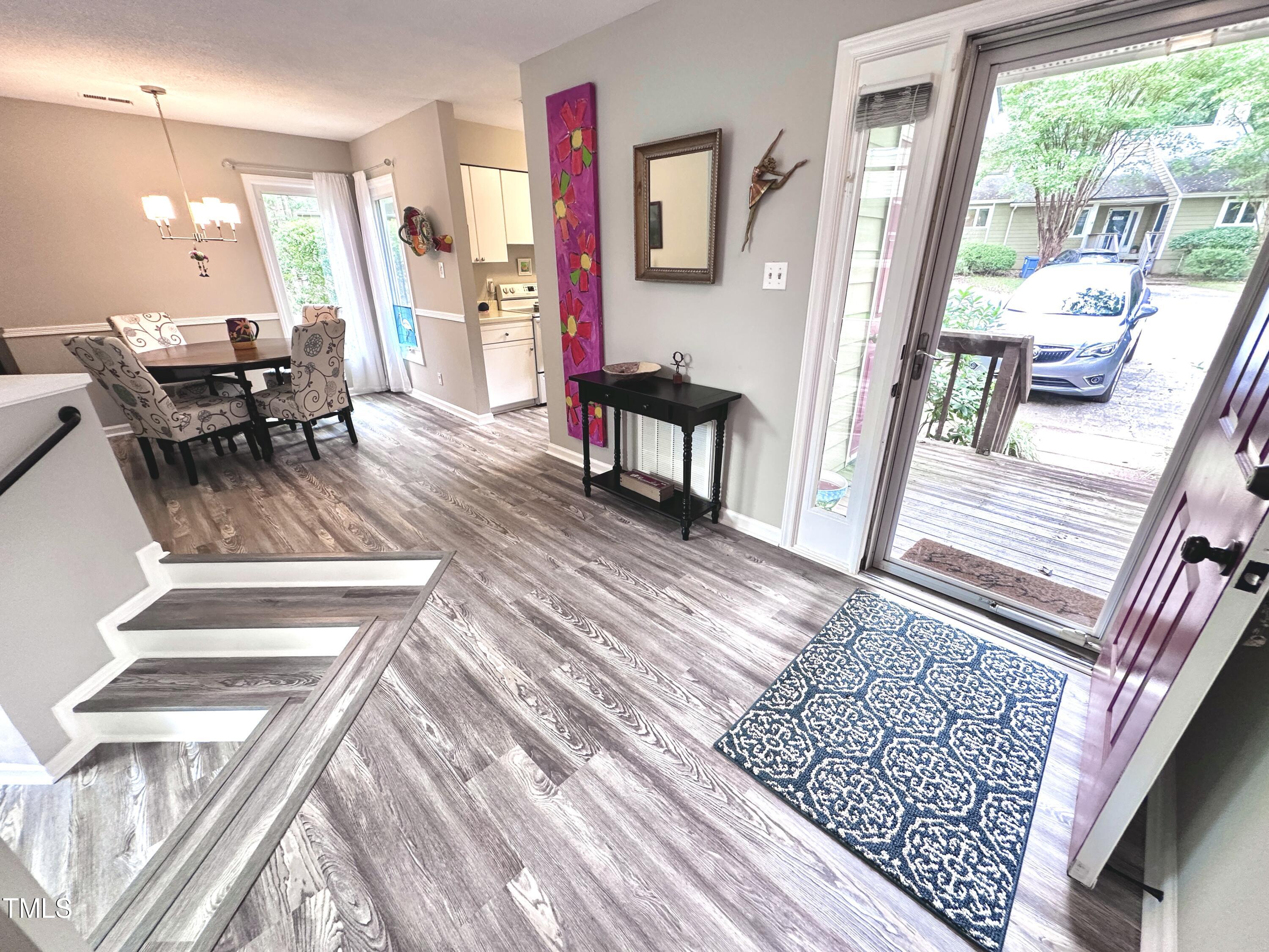 4311 Beechnut Lane Durham, NC 27707 - Photo 29 of 56 a view of a living room and dining room