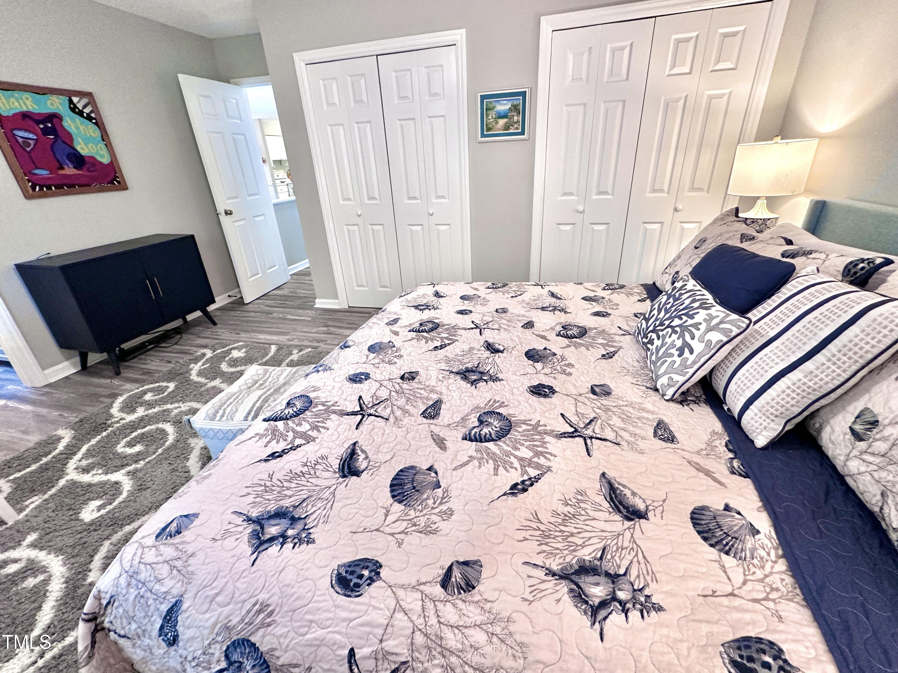 4311 Beechnut Lane Durham, NC 27707 - Photo 31 of 56 a bedroom with a bed and a window