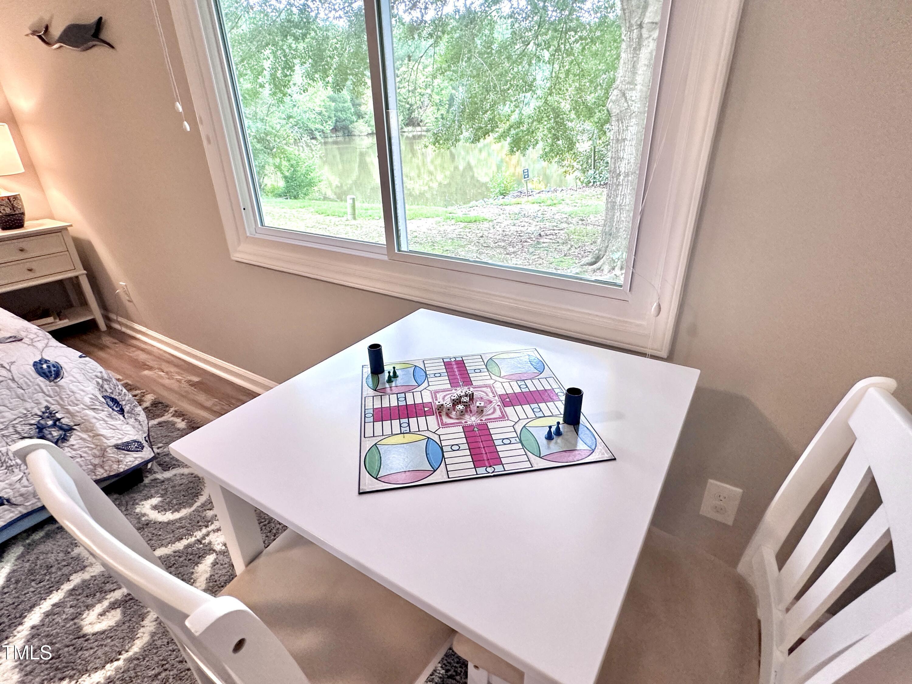 4311 Beechnut Lane Durham, NC 27707 - Photo 32 of 56 a view of kitchen with furniture and window