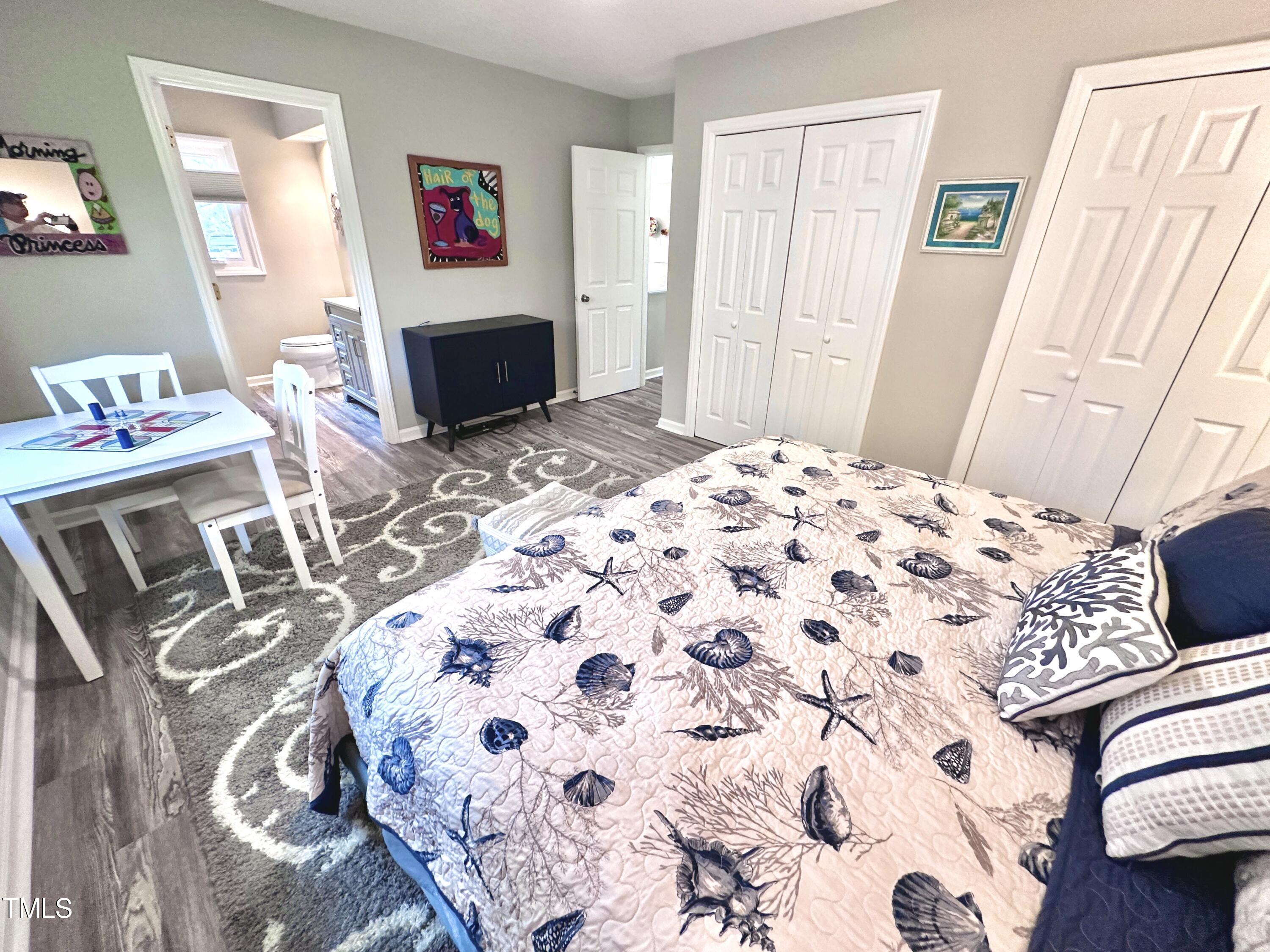 4311 Beechnut Lane Durham, NC 27707 - Photo 37 of 56 a bedroom with a bed and a window