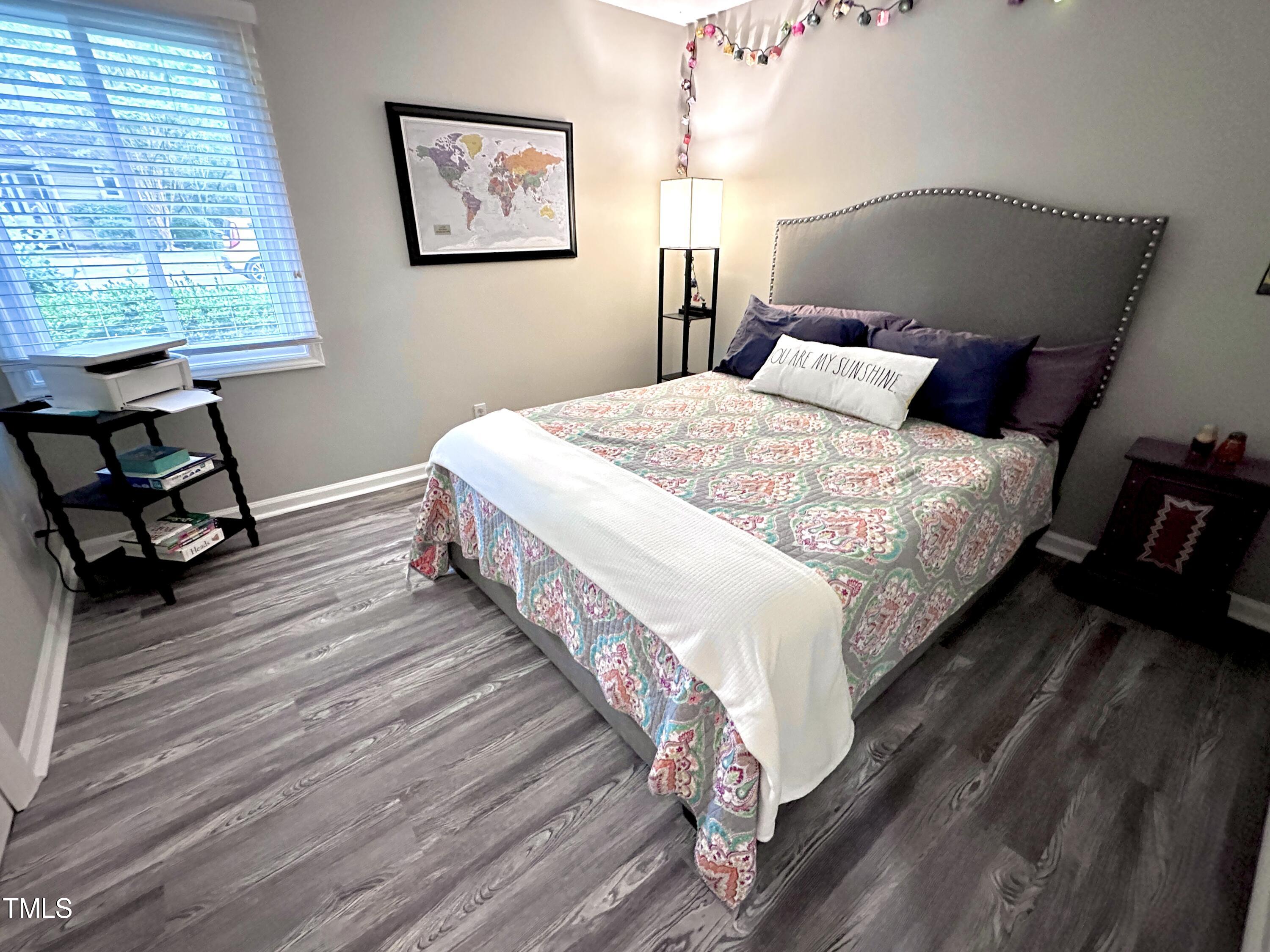 4311 Beechnut Lane Durham, NC 27707 - Photo 39 of 56 a bedroom with bed and a window