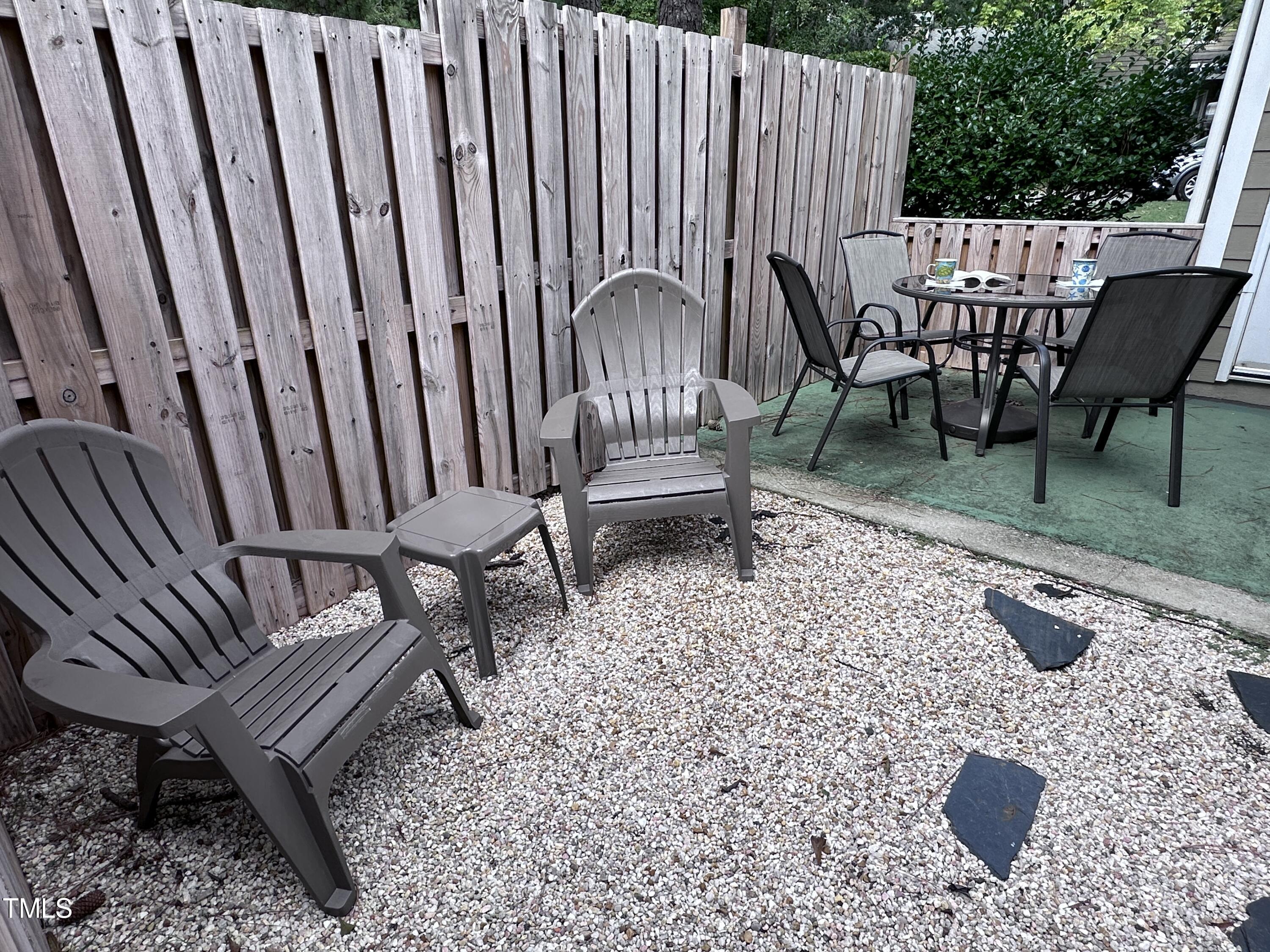 4311 Beechnut Lane Durham, NC 27707 - Photo 45 of 56 a view of a chairs in patio