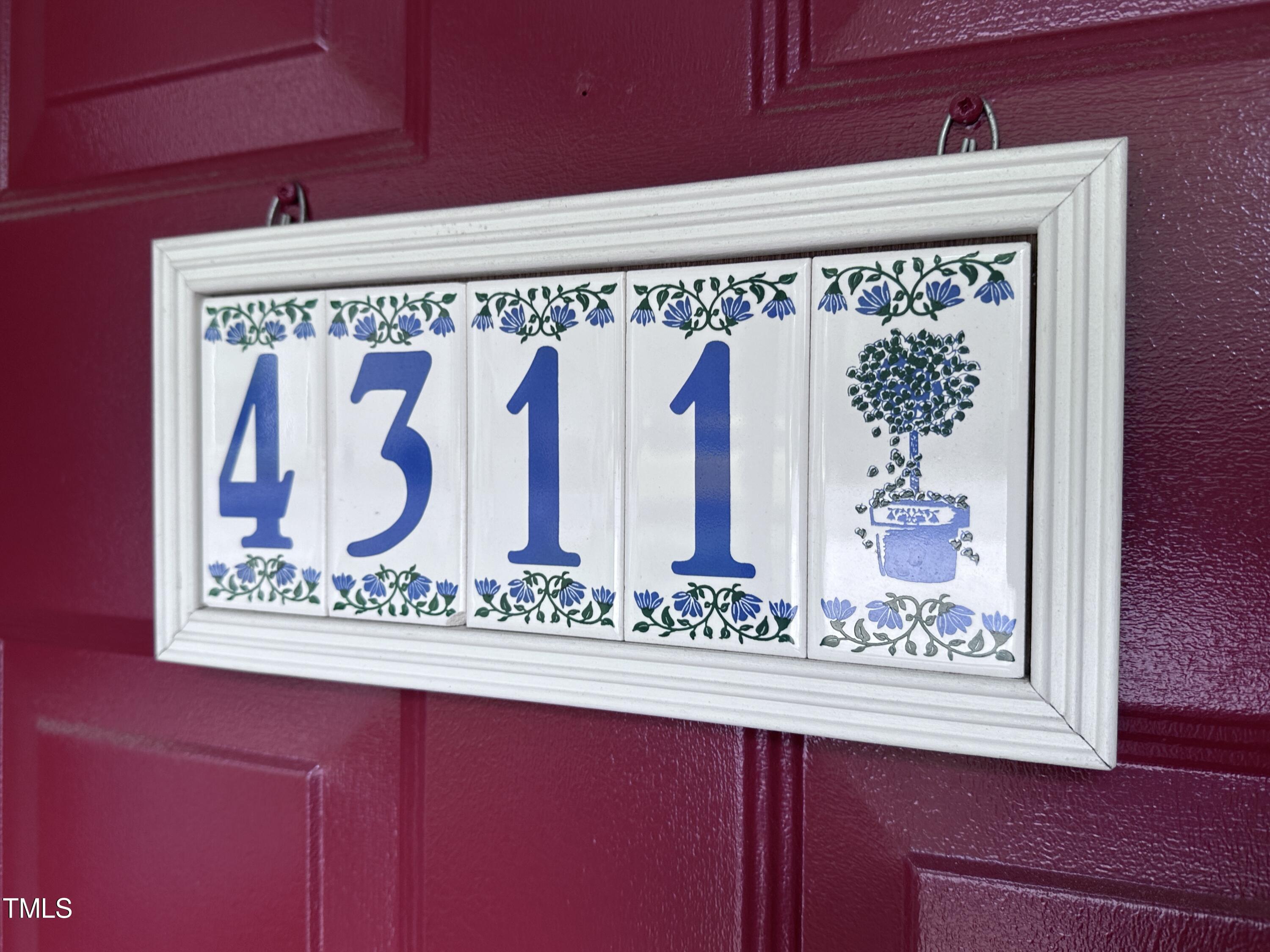 4311 Beechnut Lane Durham, NC 27707 - Photo 47 of 56 a close up of a sign