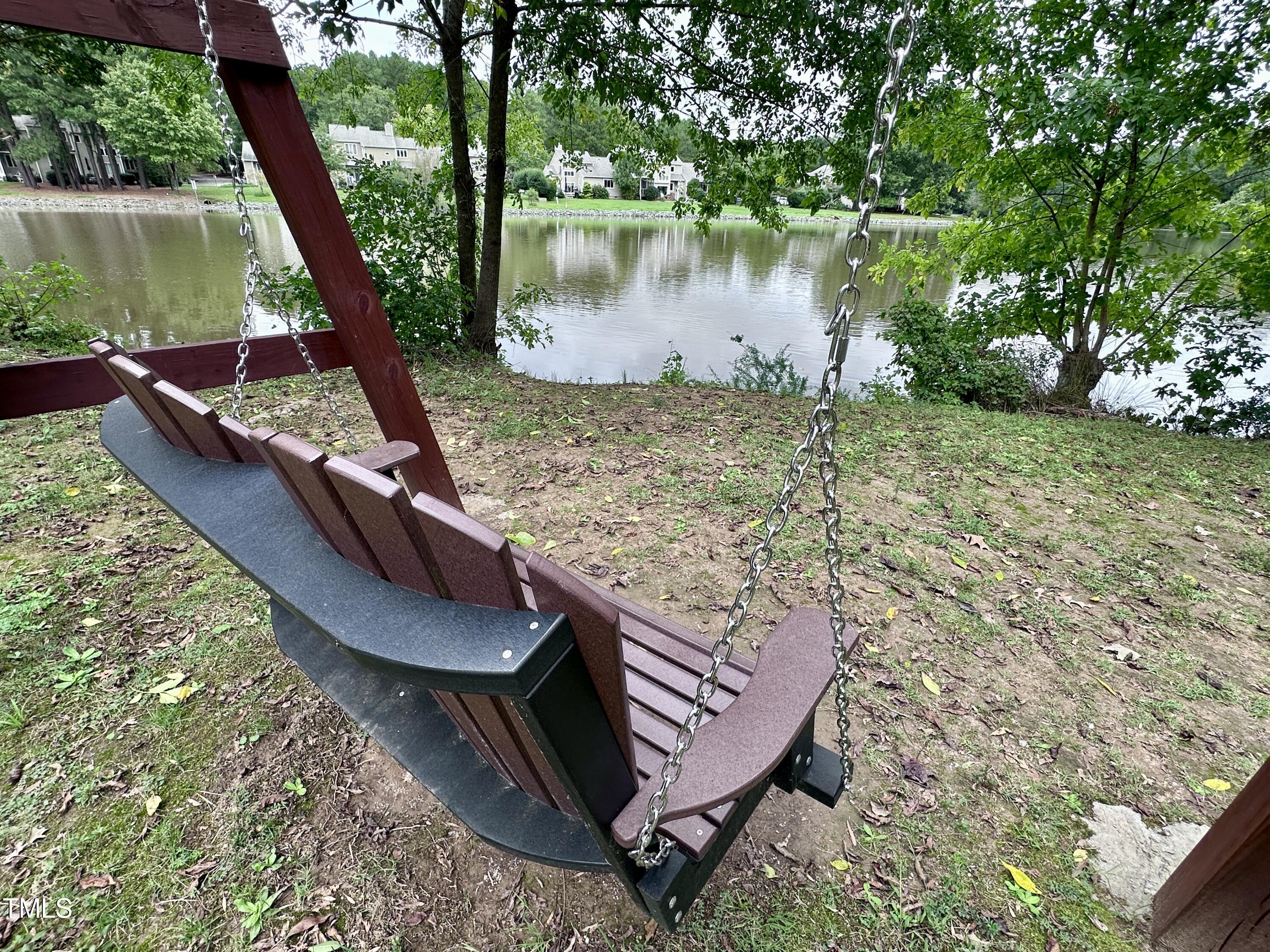 4311 Beechnut Lane Durham, NC 27707 - Photo 52 of 56 a view of a wooden deck with lake view