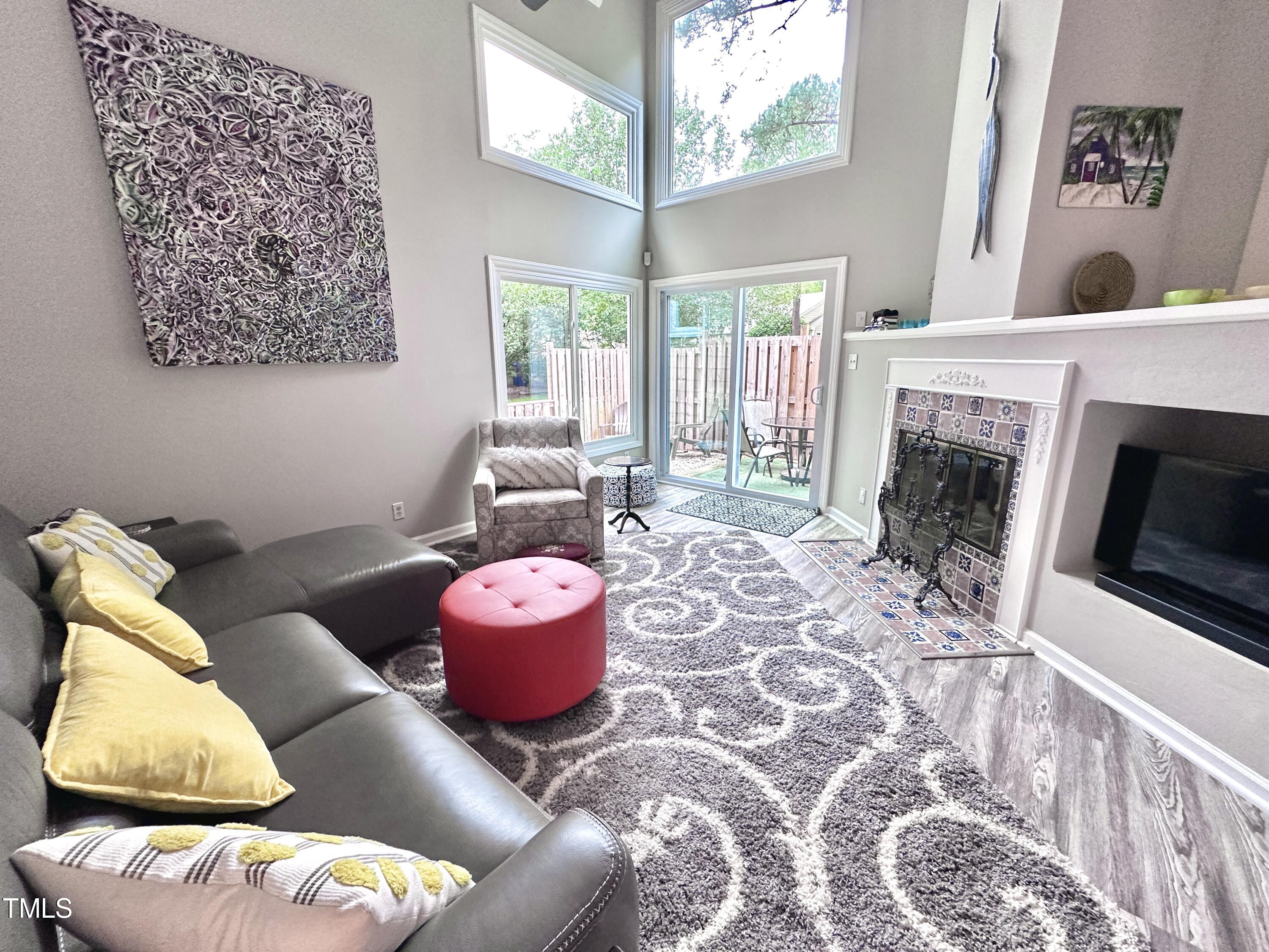 4311 Beechnut Lane Durham, NC 27707 - Photo 8 of 56 a living room with furniture and a fireplace
