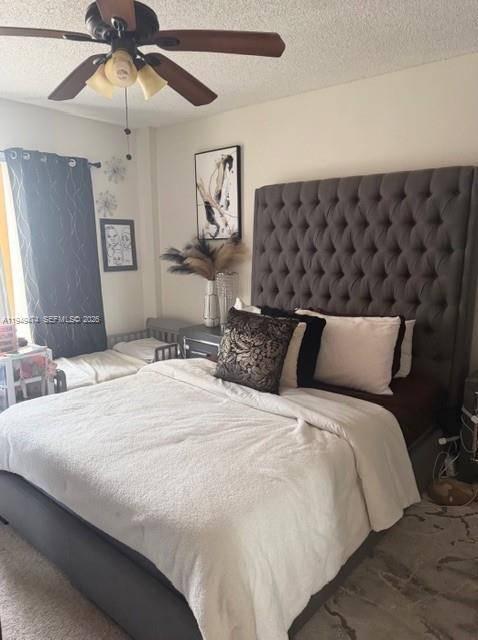 4164 Inverrary Drive, Unit 913 Lauderhill, FL 33319 - Photo 15 of 25 a bedroom with bed and wooden floor