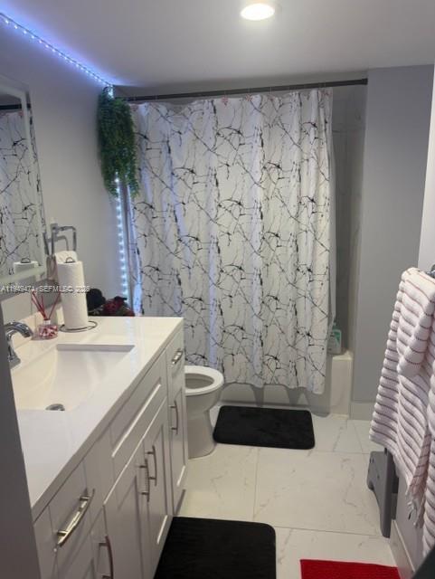 4164 Inverrary Drive, Unit 913 Lauderhill, FL 33319 - Photo 17 of 25 a bathroom with a sink a toilet and shower