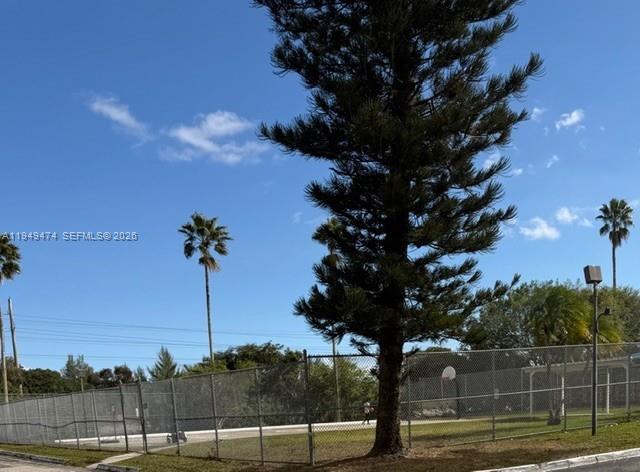 4164 Inverrary Drive, Unit 913 Lauderhill, FL 33319 - Photo 24 of 25 a view of a yard with a tree
