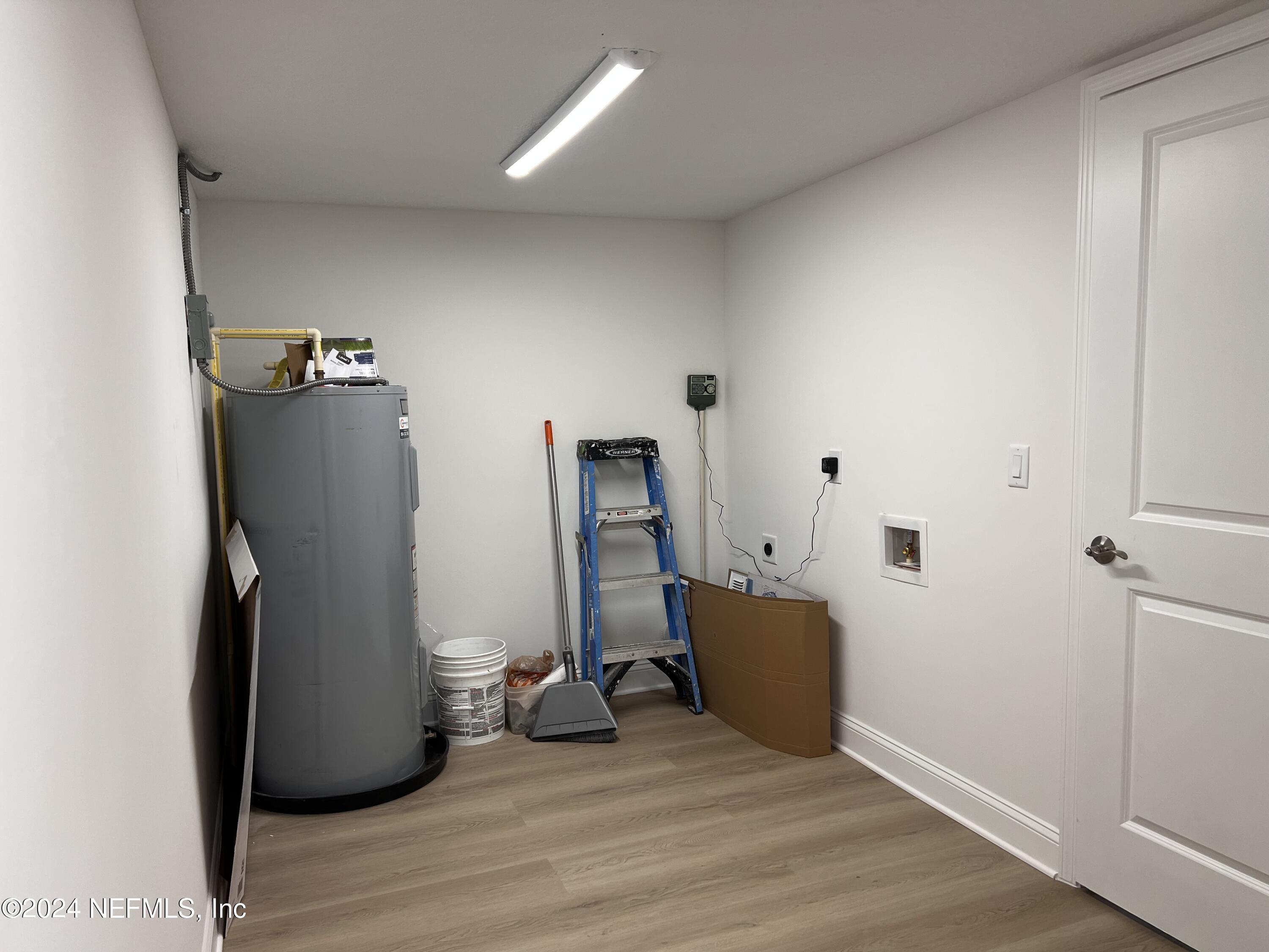 1833 Bartram Road Jacksonville, FL 32207 - Photo 28 of 50 a view of a refrigerator in kitchen and a window