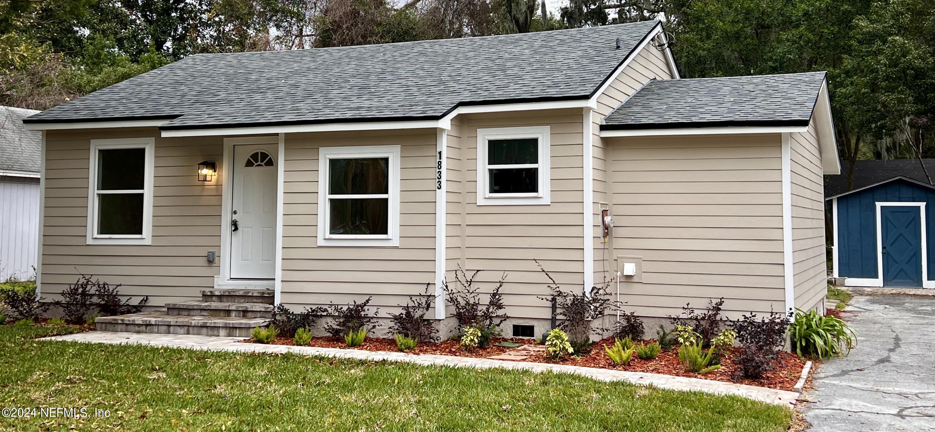 1833 Bartram Road Jacksonville, FL 32207 - Photo 3 of 50 a front view of house with yard
