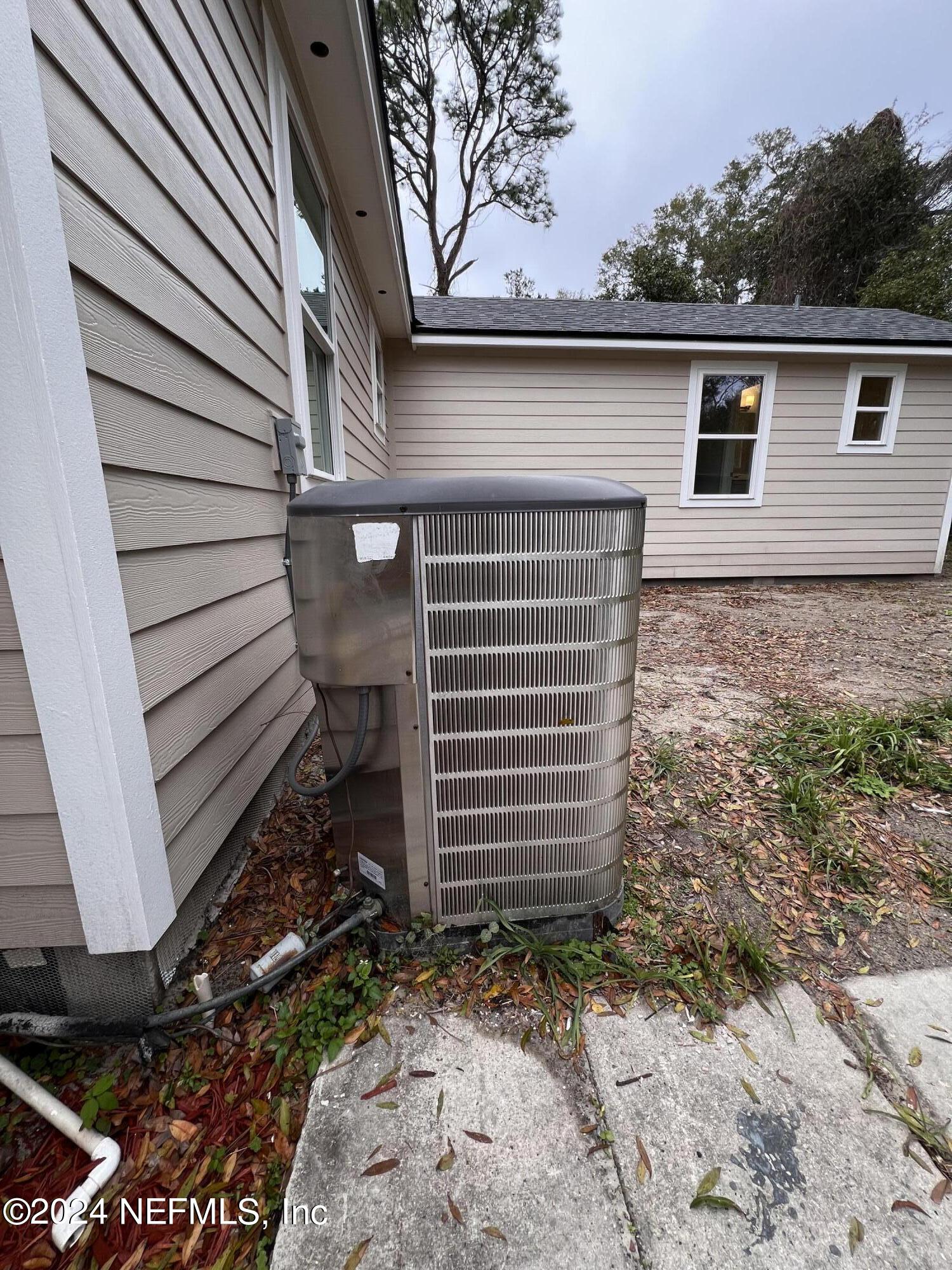 1833 Bartram Road Jacksonville, FL 32207 - Photo 32 of 50 a view of a house with a yard