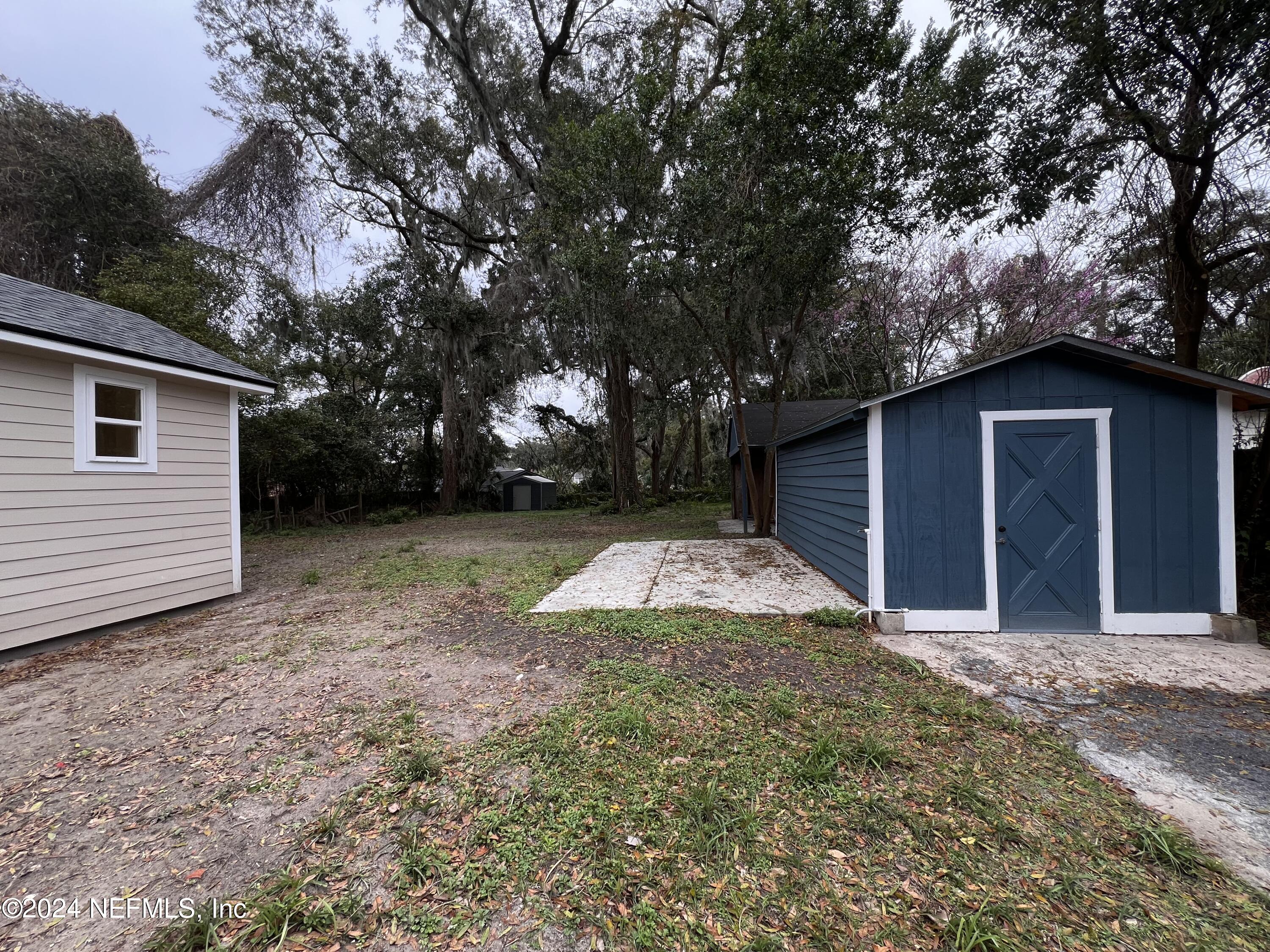 1833 Bartram Road Jacksonville, FL 32207 - Photo 33 of 50 a view of backyard of house with green space