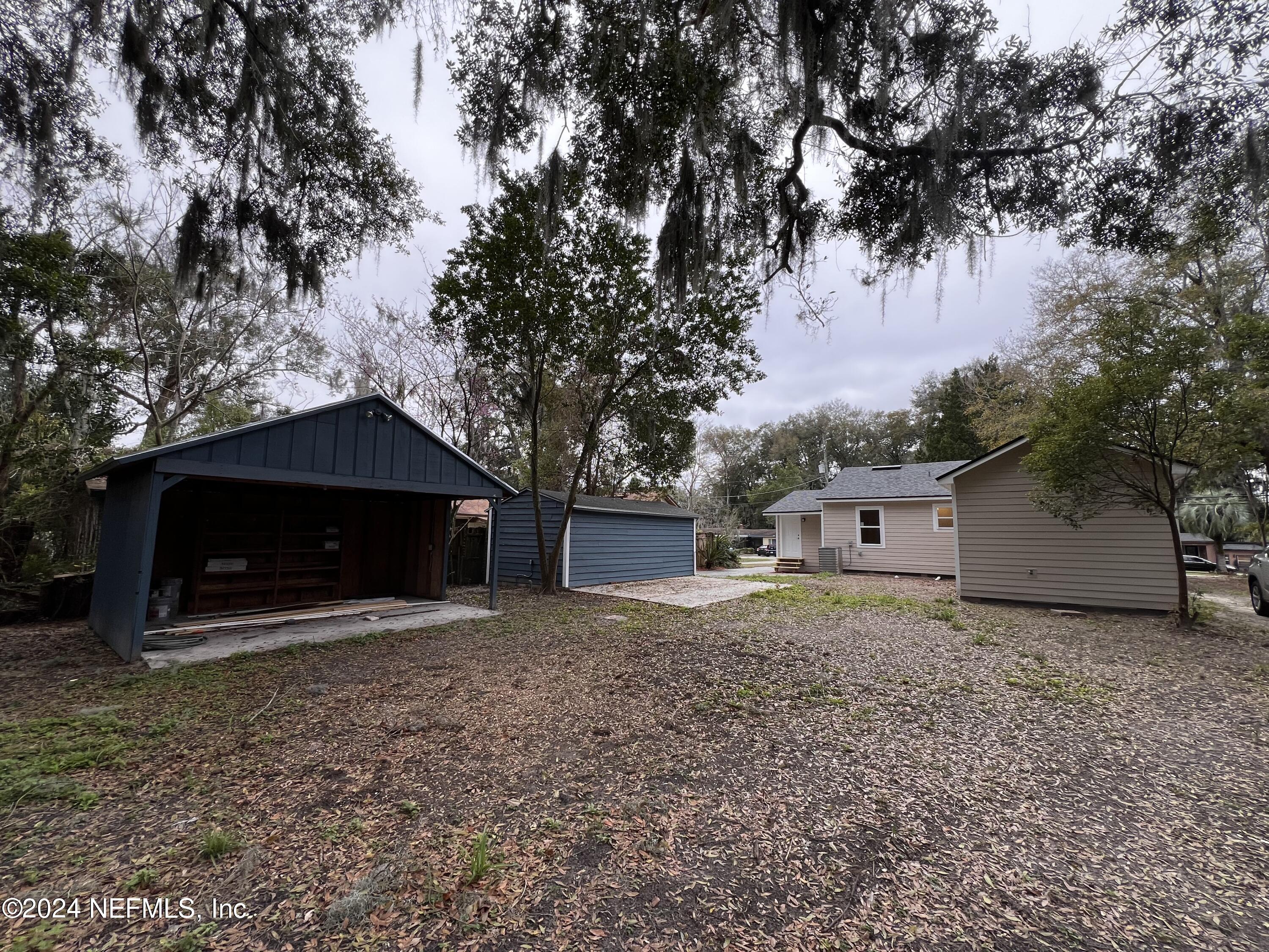 1833 Bartram Road Jacksonville, FL 32207 - Photo 36 of 50 a view of a house with a yard