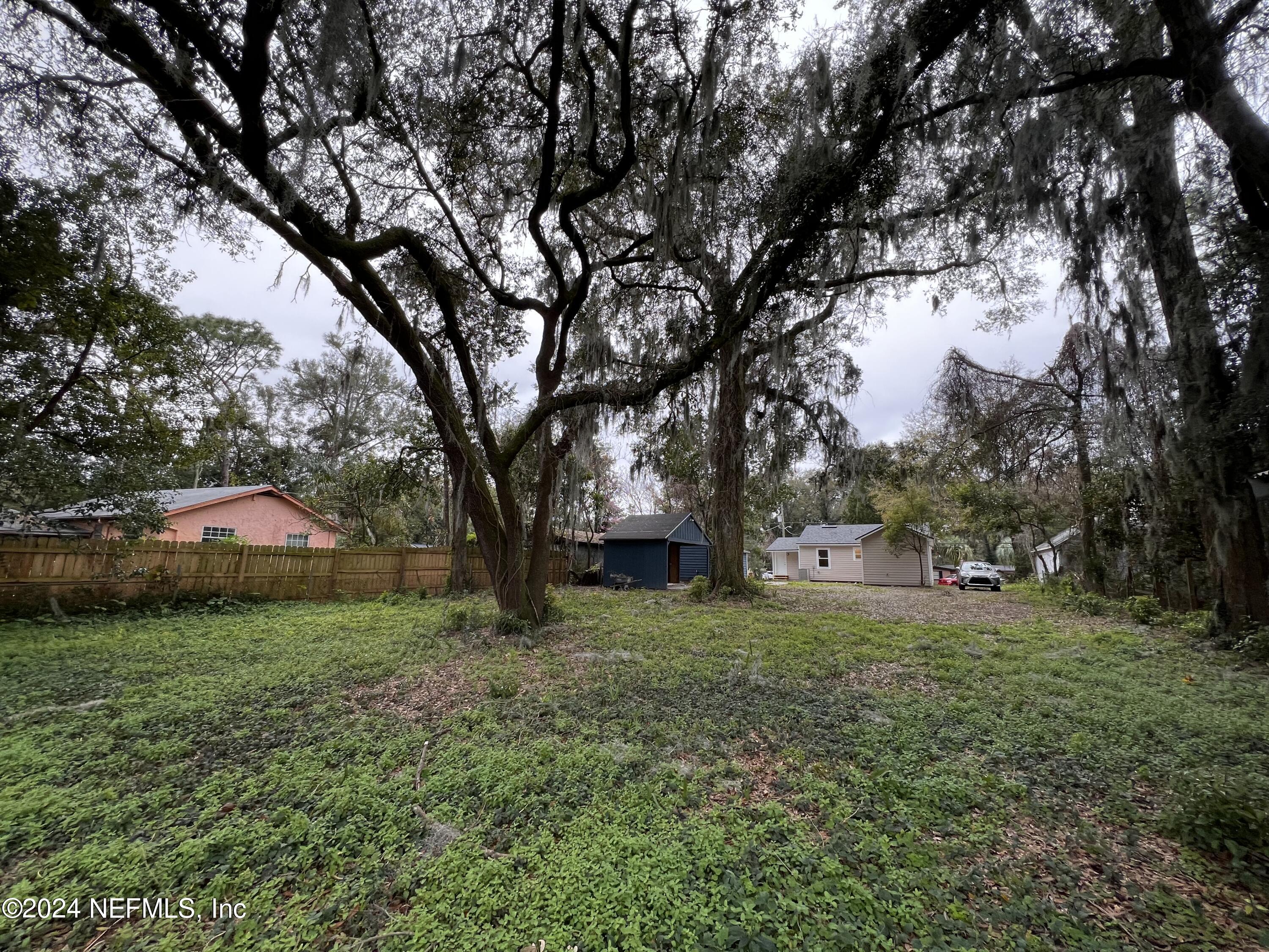 1833 Bartram Road Jacksonville, FL 32207 - Photo 38 of 50 a view of a tree in front of a house