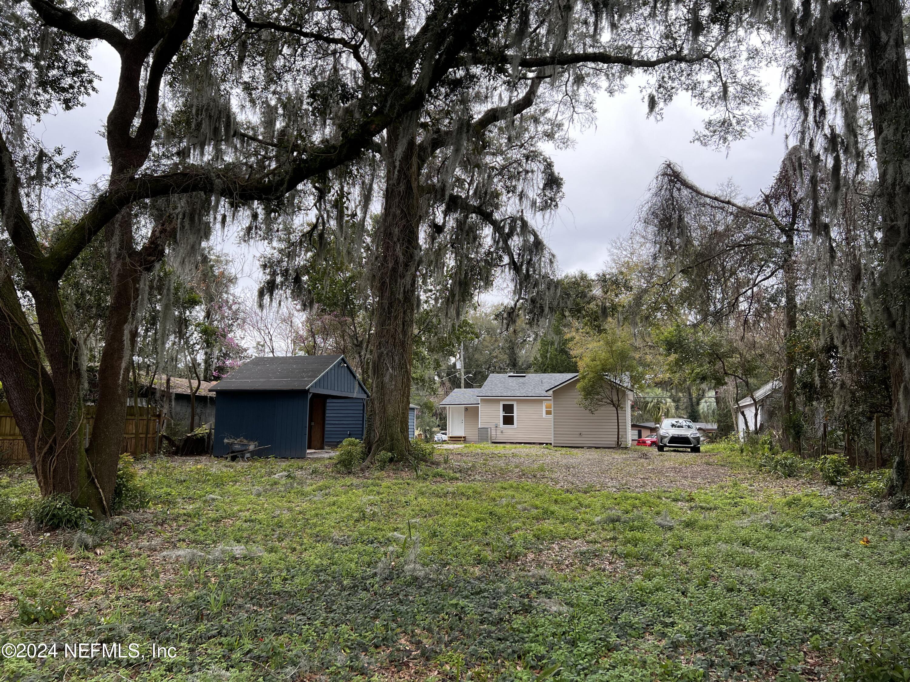 1833 Bartram Road Jacksonville, FL 32207 - Photo 39 of 50 a house view with a lake view