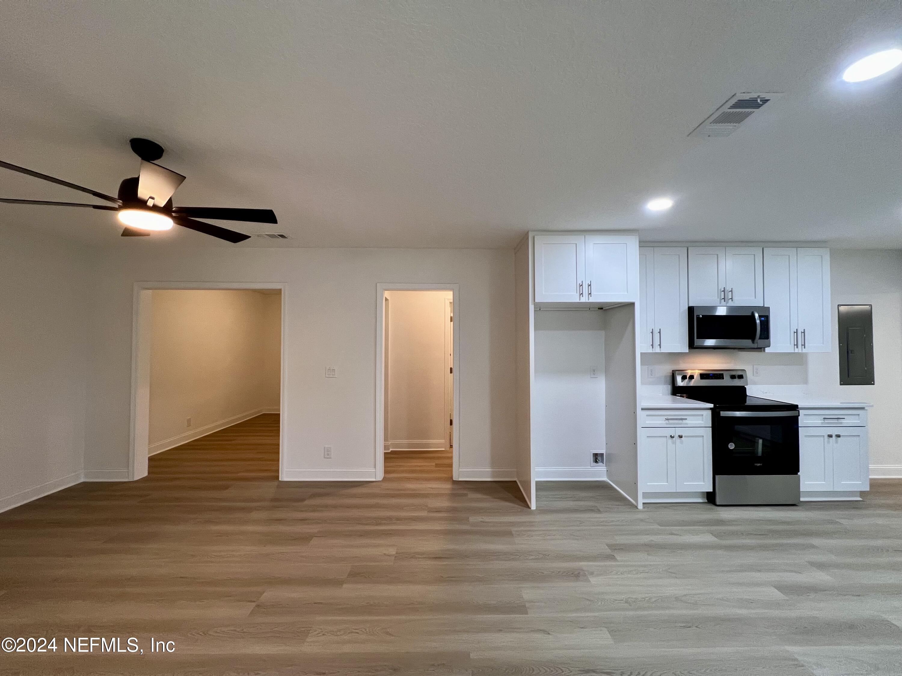 1833 Bartram Road Jacksonville, FL 32207 - Photo 10 of 50 a view of kitchen with stainless steel appliances refrigerator stove microwave and cabinets