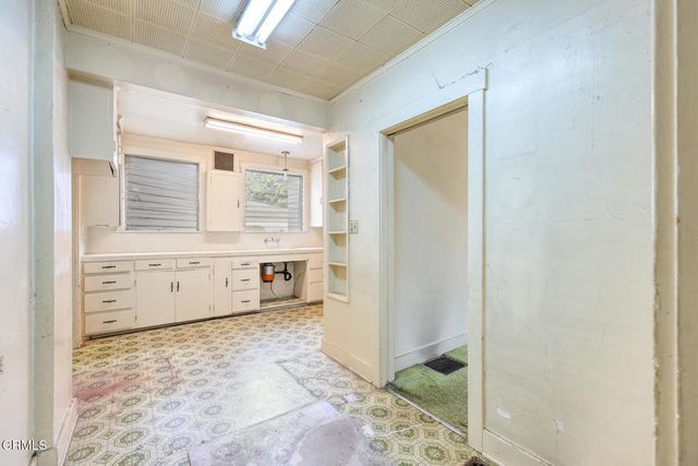 a bathroom with a sink and a toilet
