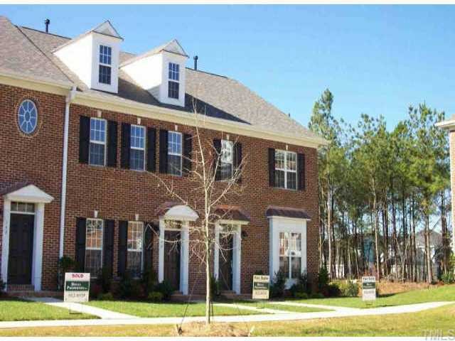 a front view of a building with street view