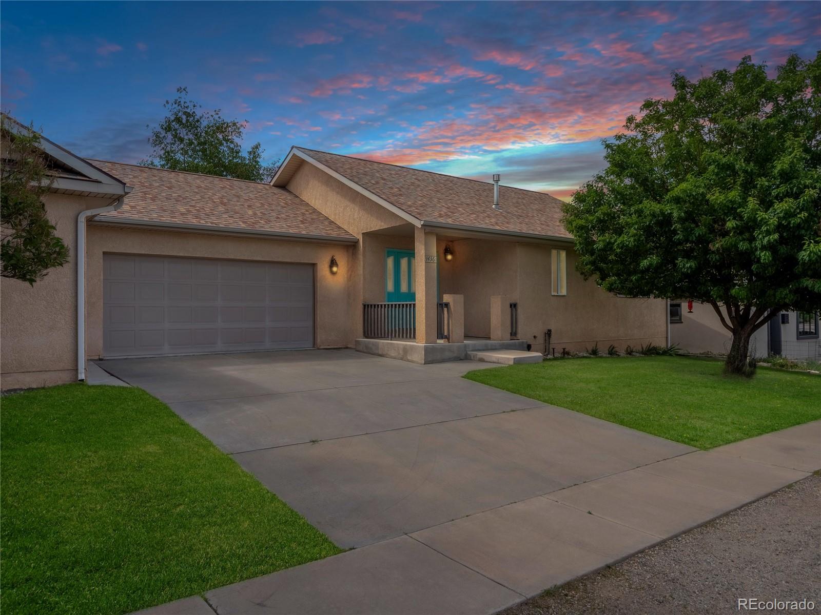 1436 H Street, Unit D Salida, CO 81201 - Photo 2 of 31 a front view of house with yard and green space