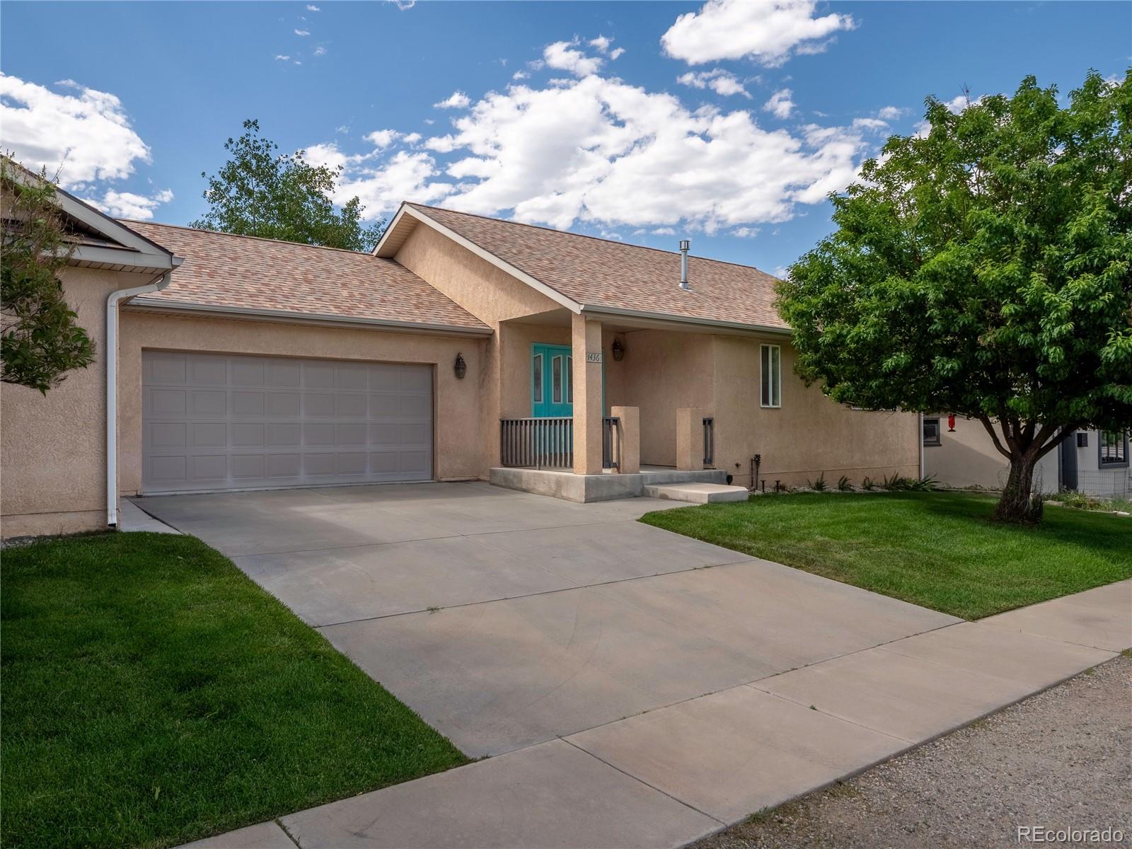 1436 H Street, Unit D Salida, CO 81201 - Photo 24 of 31 a front view of house with yard and green space