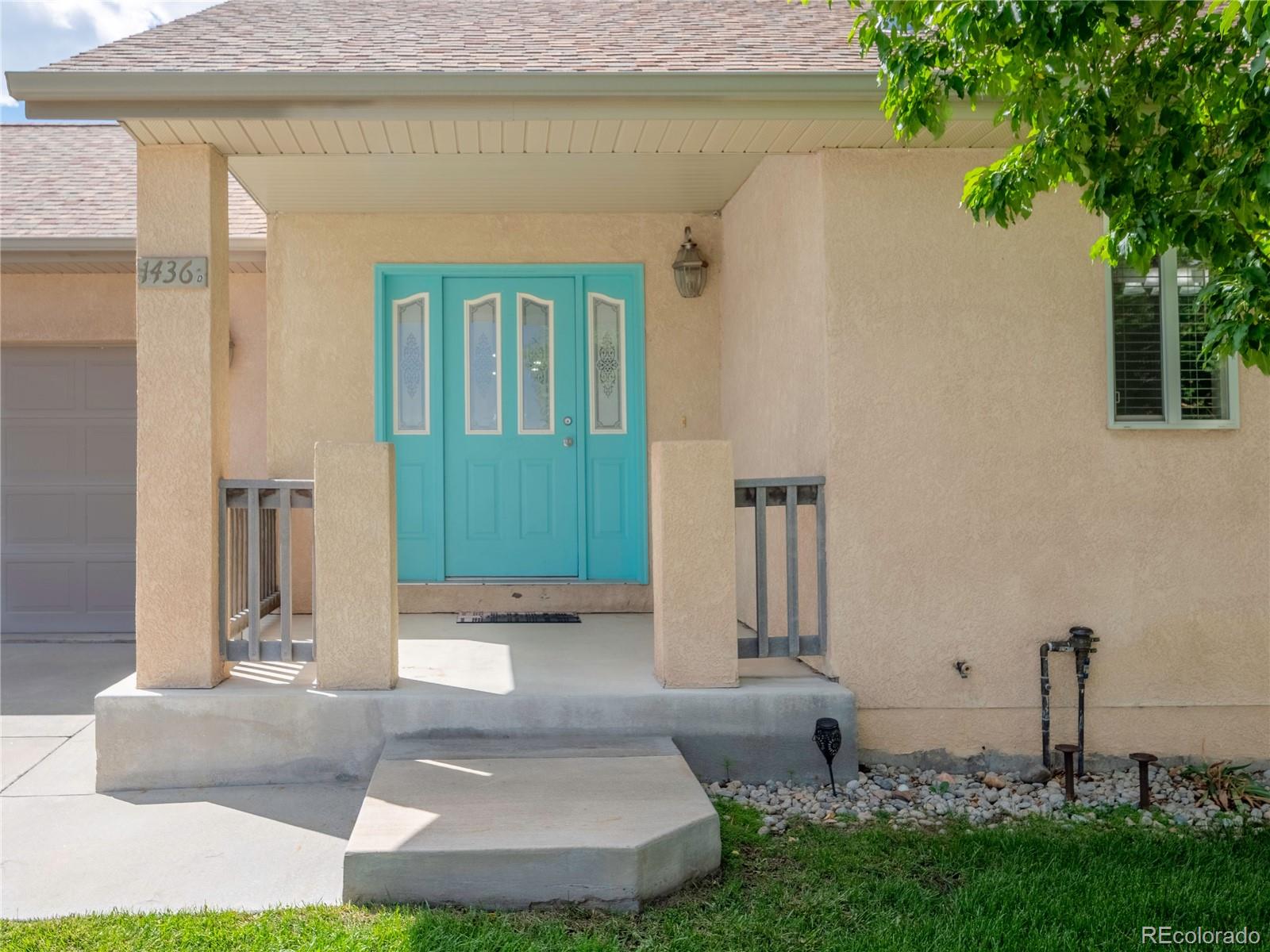 1436 H Street, Unit D Salida, CO 81201 - Photo 28 of 31 a front view of a house with garden