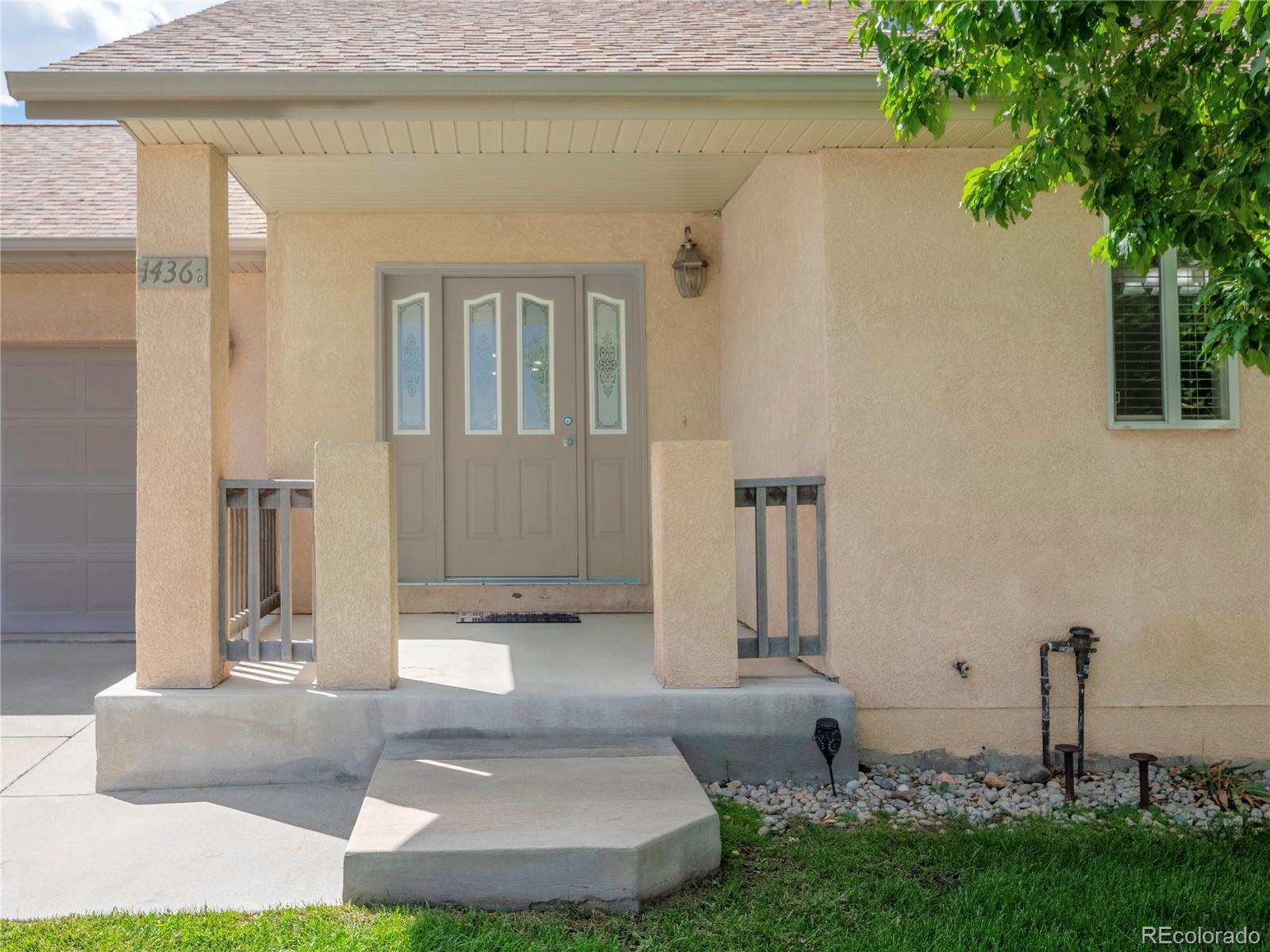 1436 H Street, Unit D Salida, CO 81201 - Photo 29 of 31 a front view of a house with garden