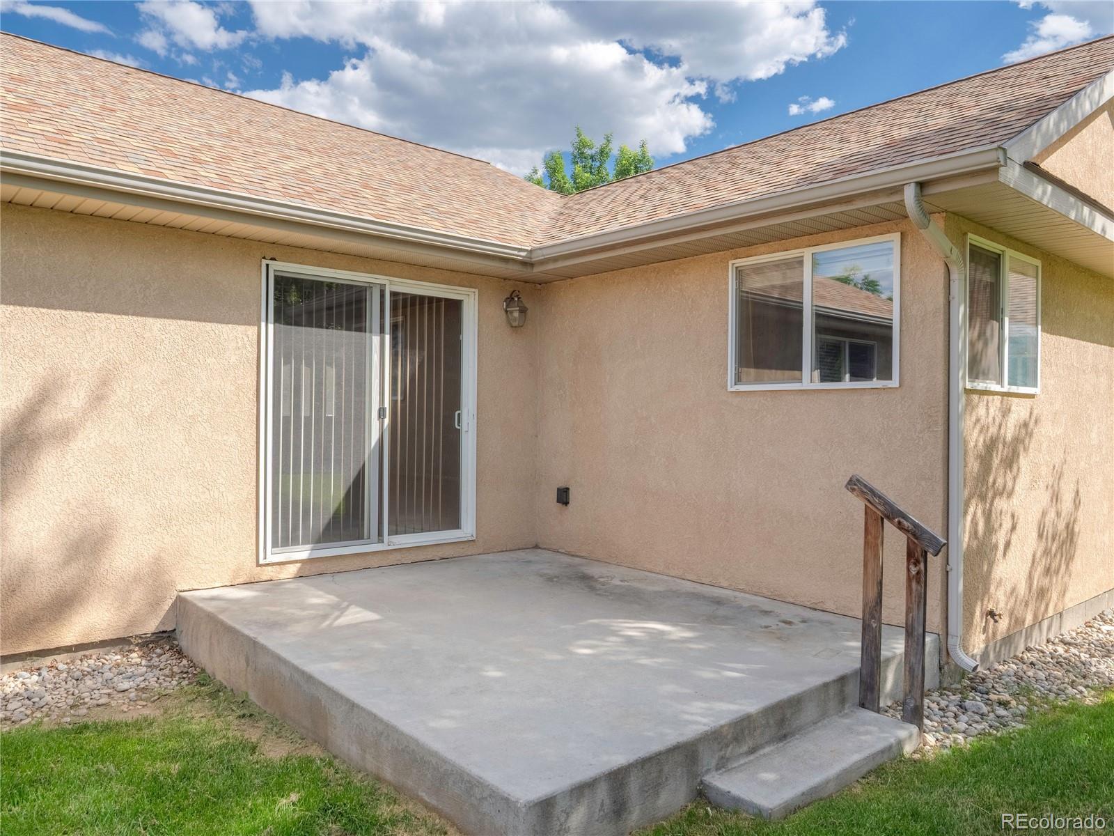 1436 H Street, Unit D Salida, CO 81201 - Photo 30 of 31 a front view of a house with a porch
