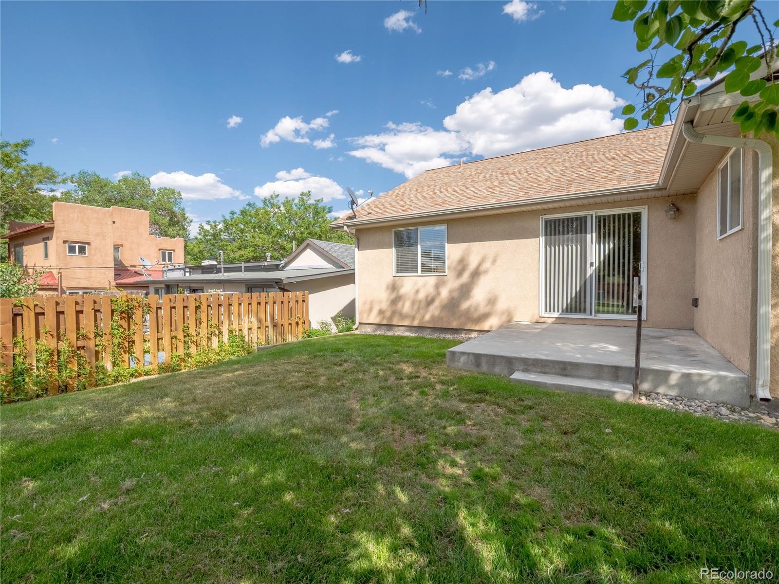 1436 H Street, Unit D Salida, CO 81201 - Photo 31 of 31 a view of a house with a yard and a garden